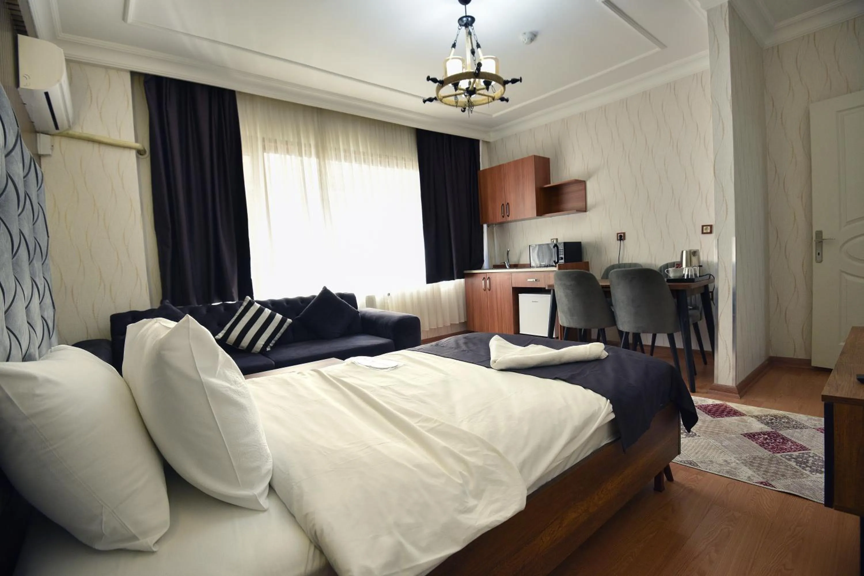 Photo of the whole room, Bed in Cihangir by Aydin Suite Hotel
