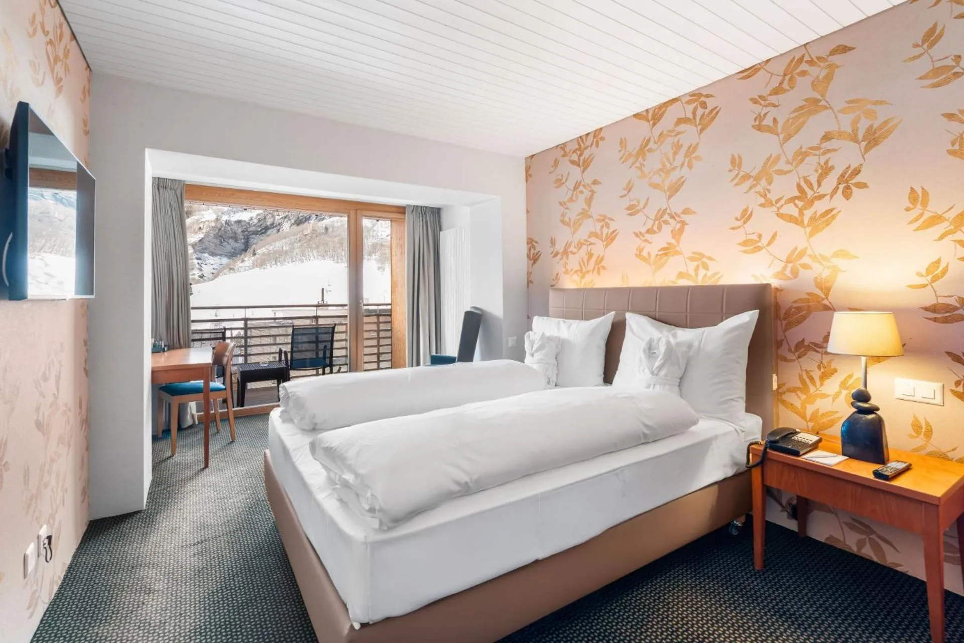 View (from property/room), Bed in Le Bristol Leukerbad