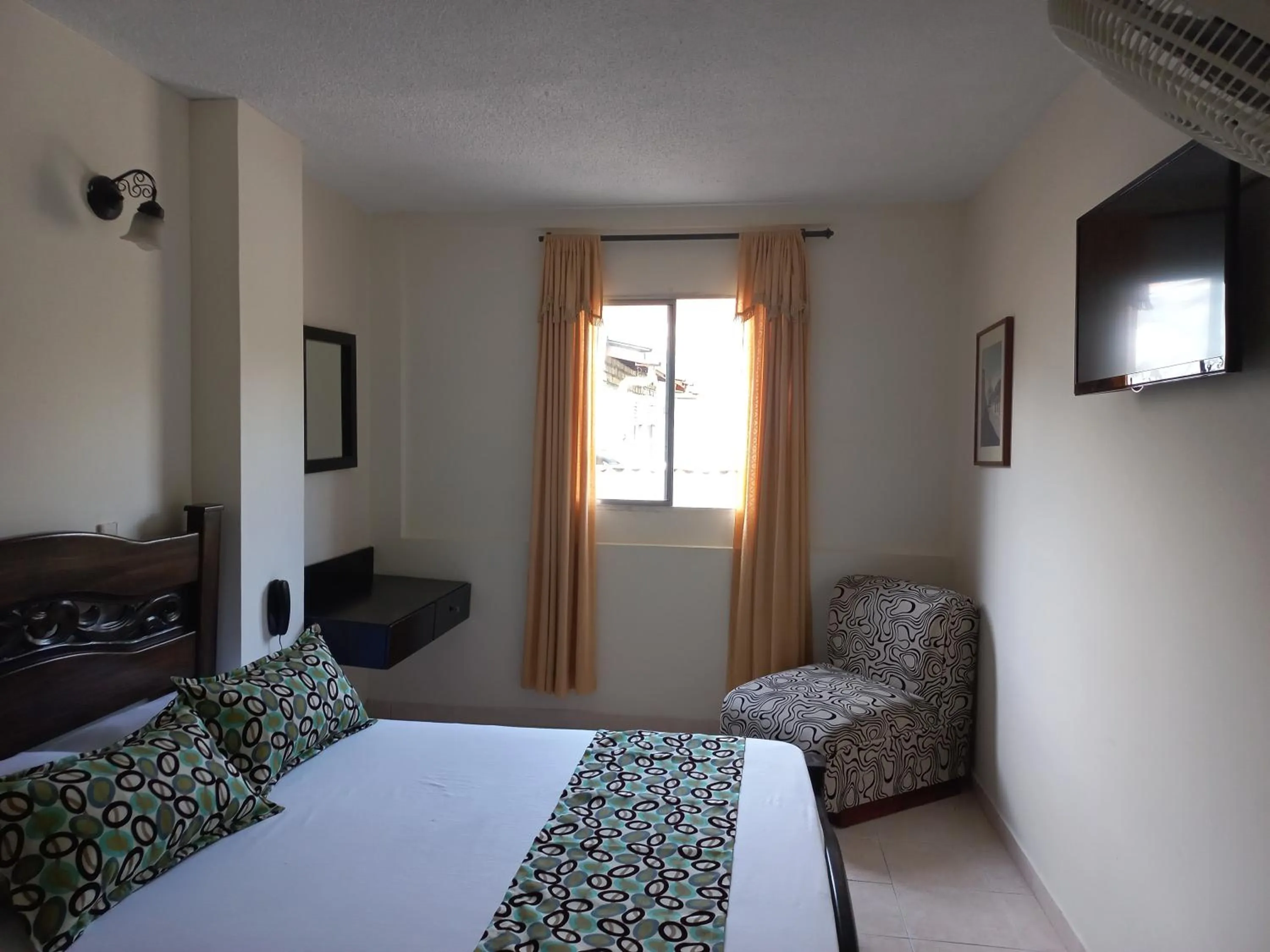 Bed in Hotel Los Tunjos