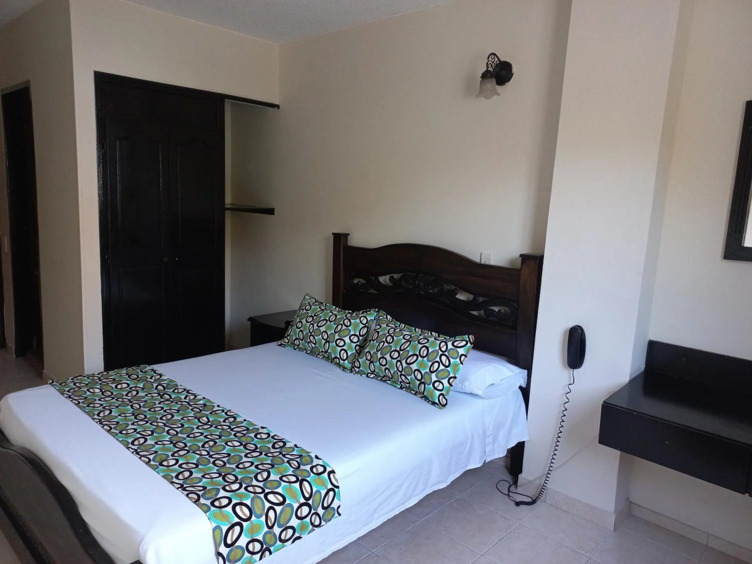 Bed in Hotel Los Tunjos