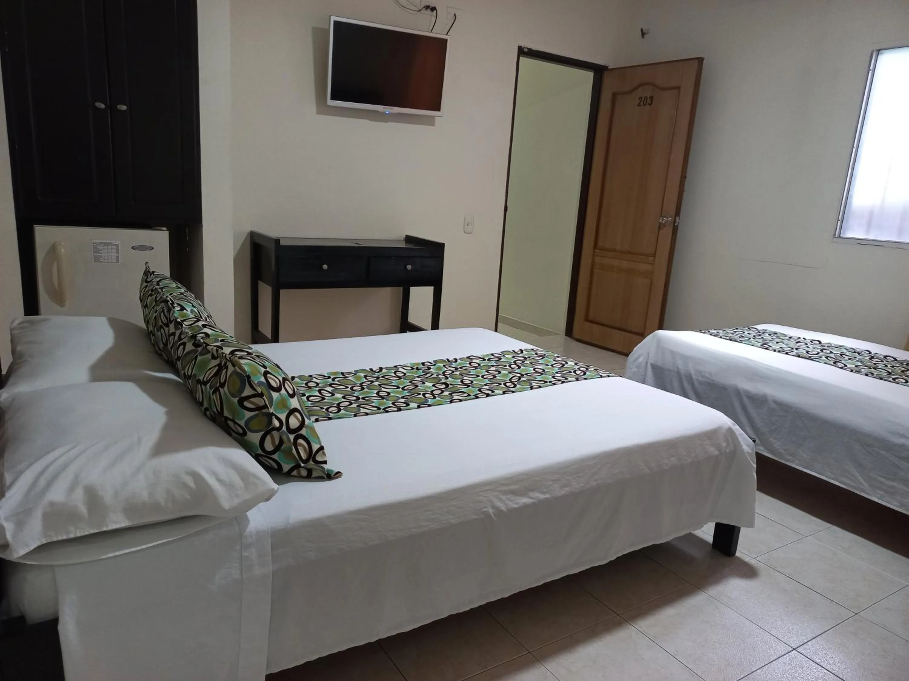 Bed in Hotel Los Tunjos