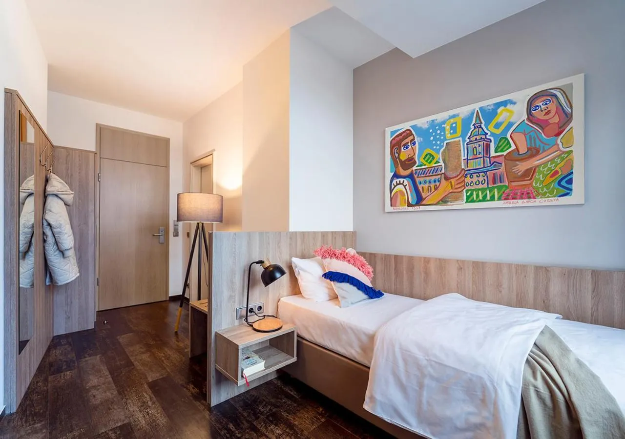 Bed in KONCEPT HOTEL Benedikt