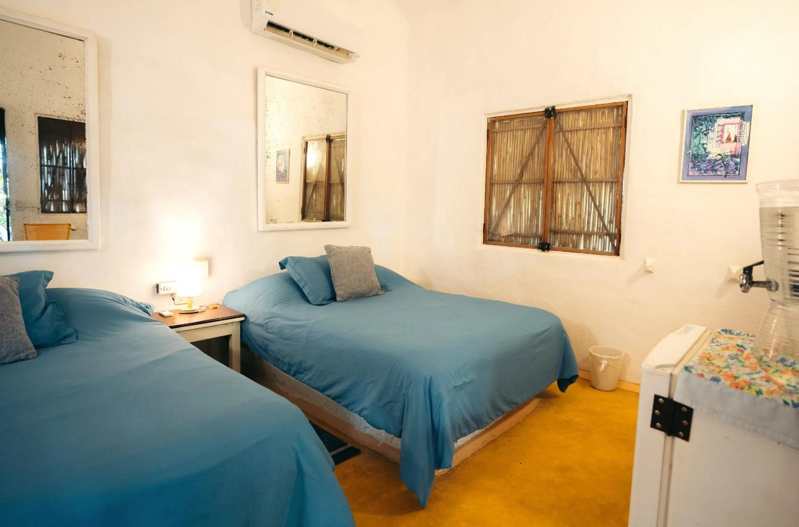 Bed in Junto al Rio Bungalows & Suites