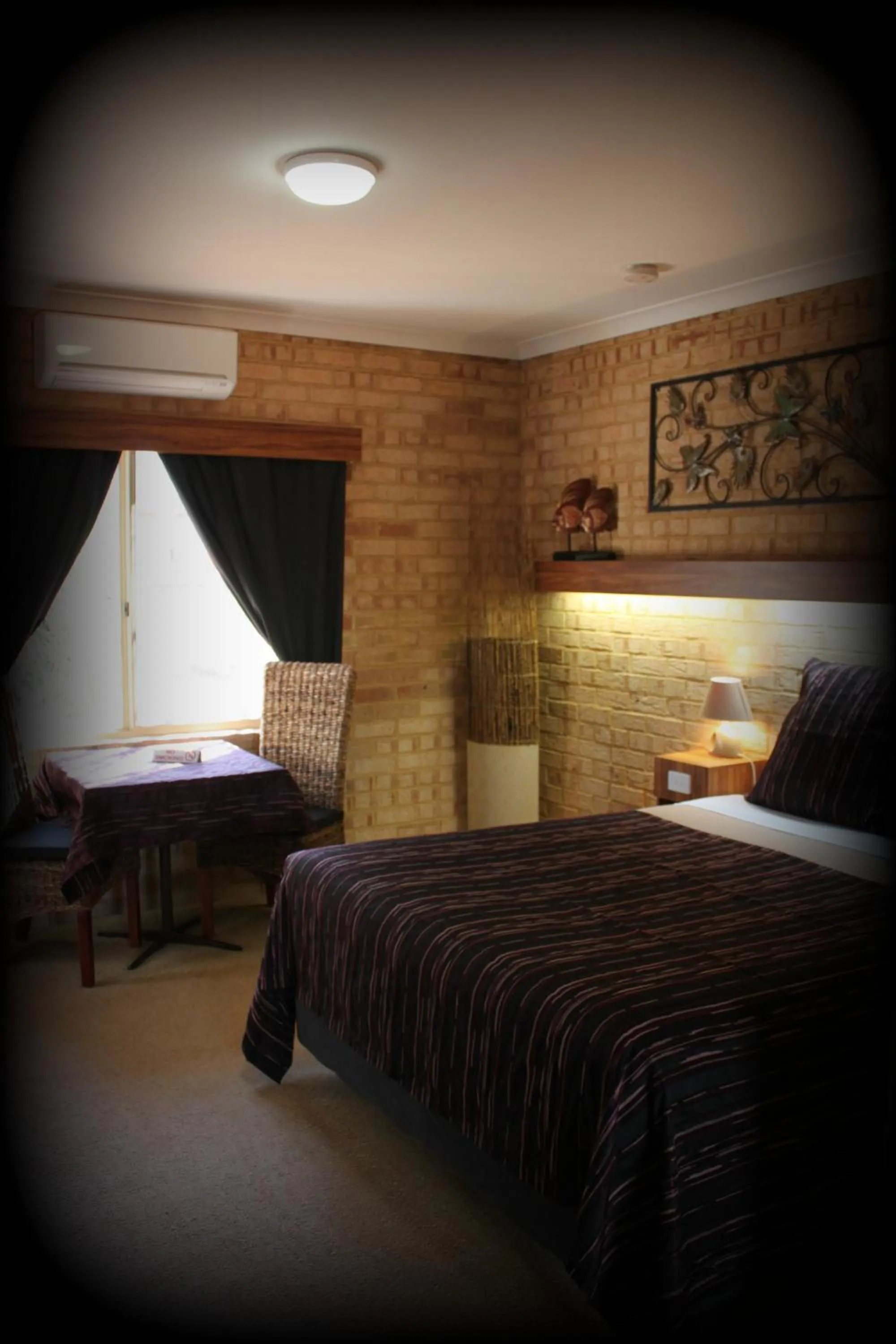 Bed in York's Boutique Motel