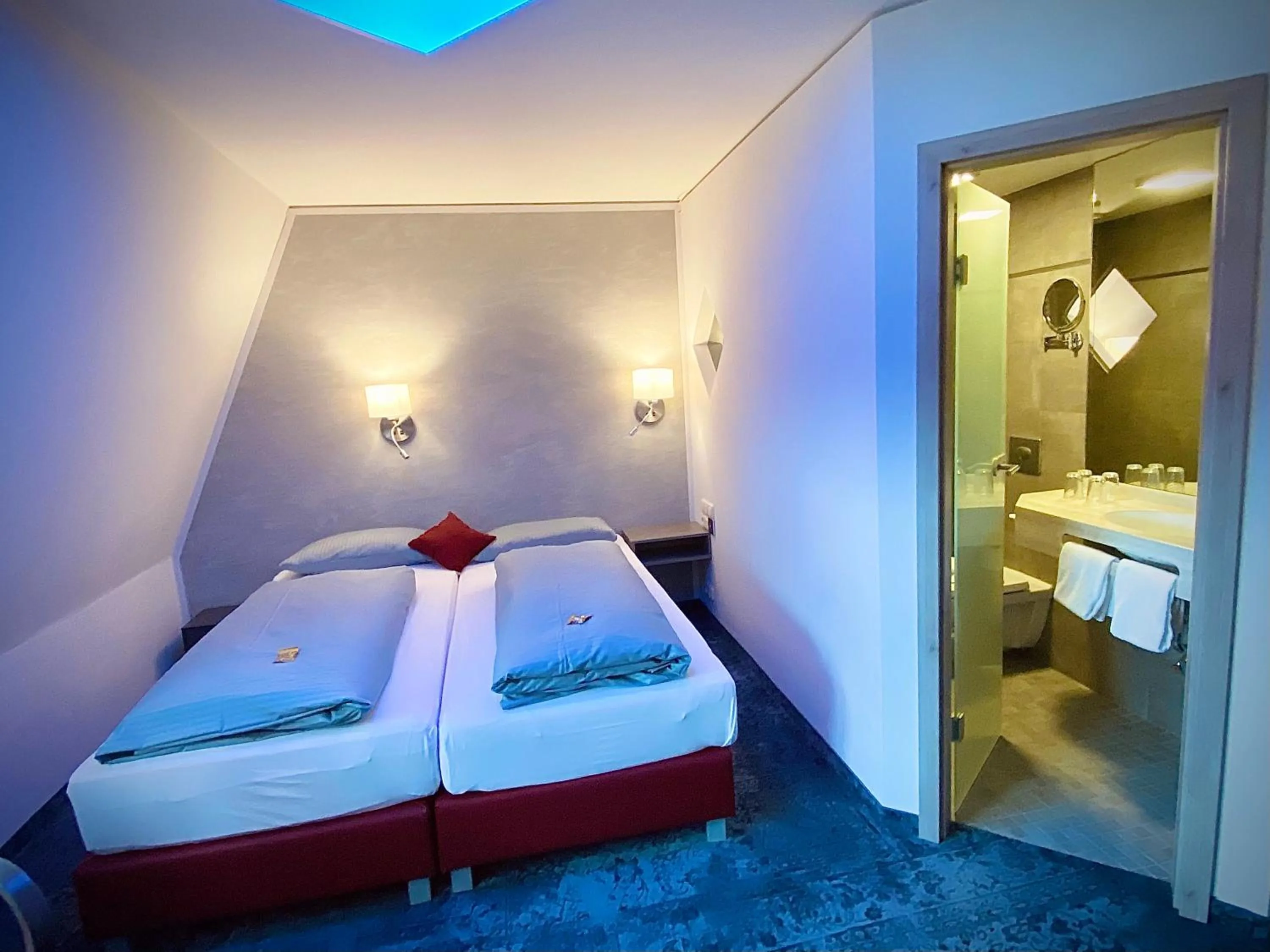 Bed in Meister BÄR HOTEL Fichtelgebirge