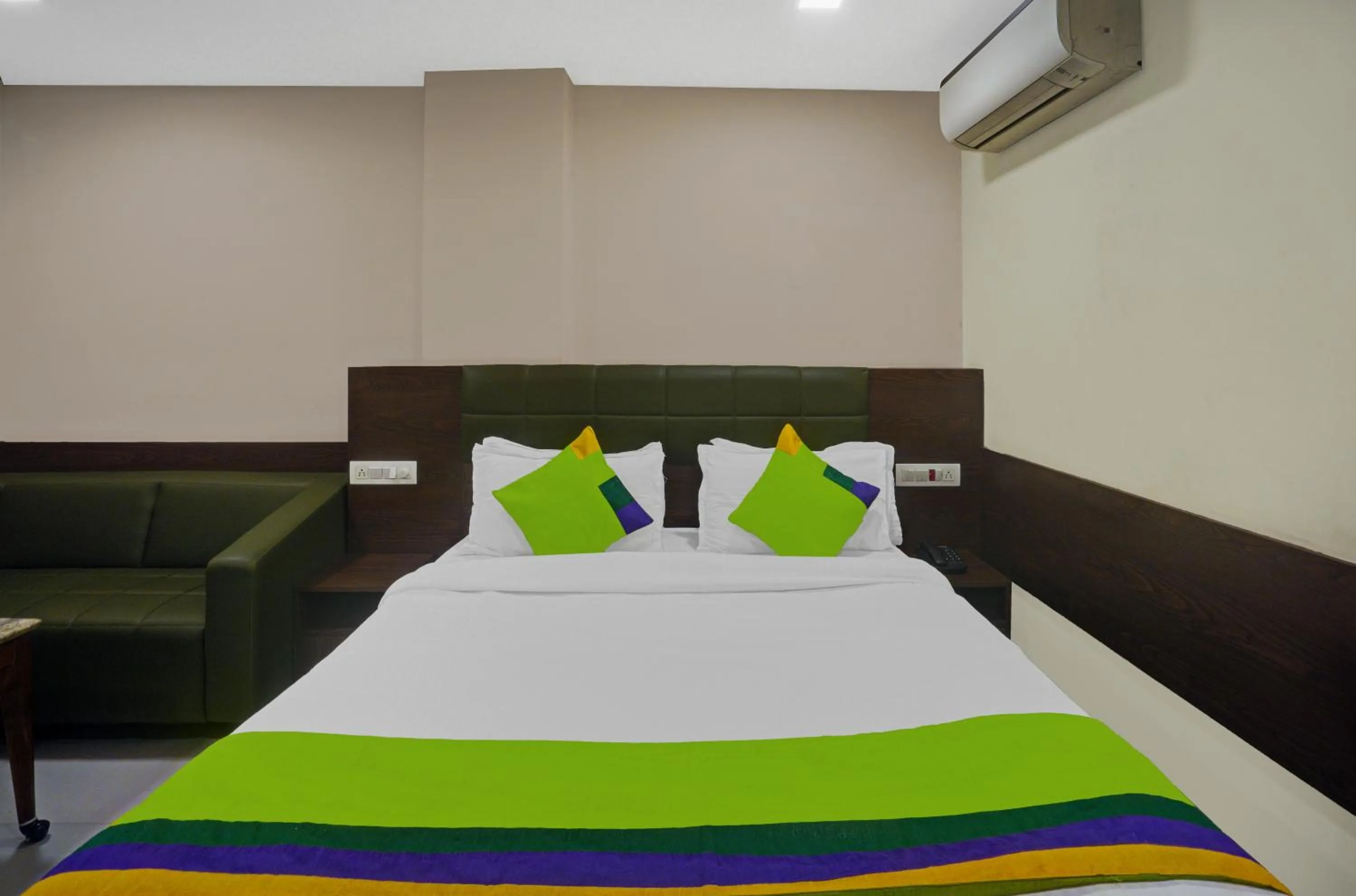 Bed in Greenotel Rooms Hazira, Surat