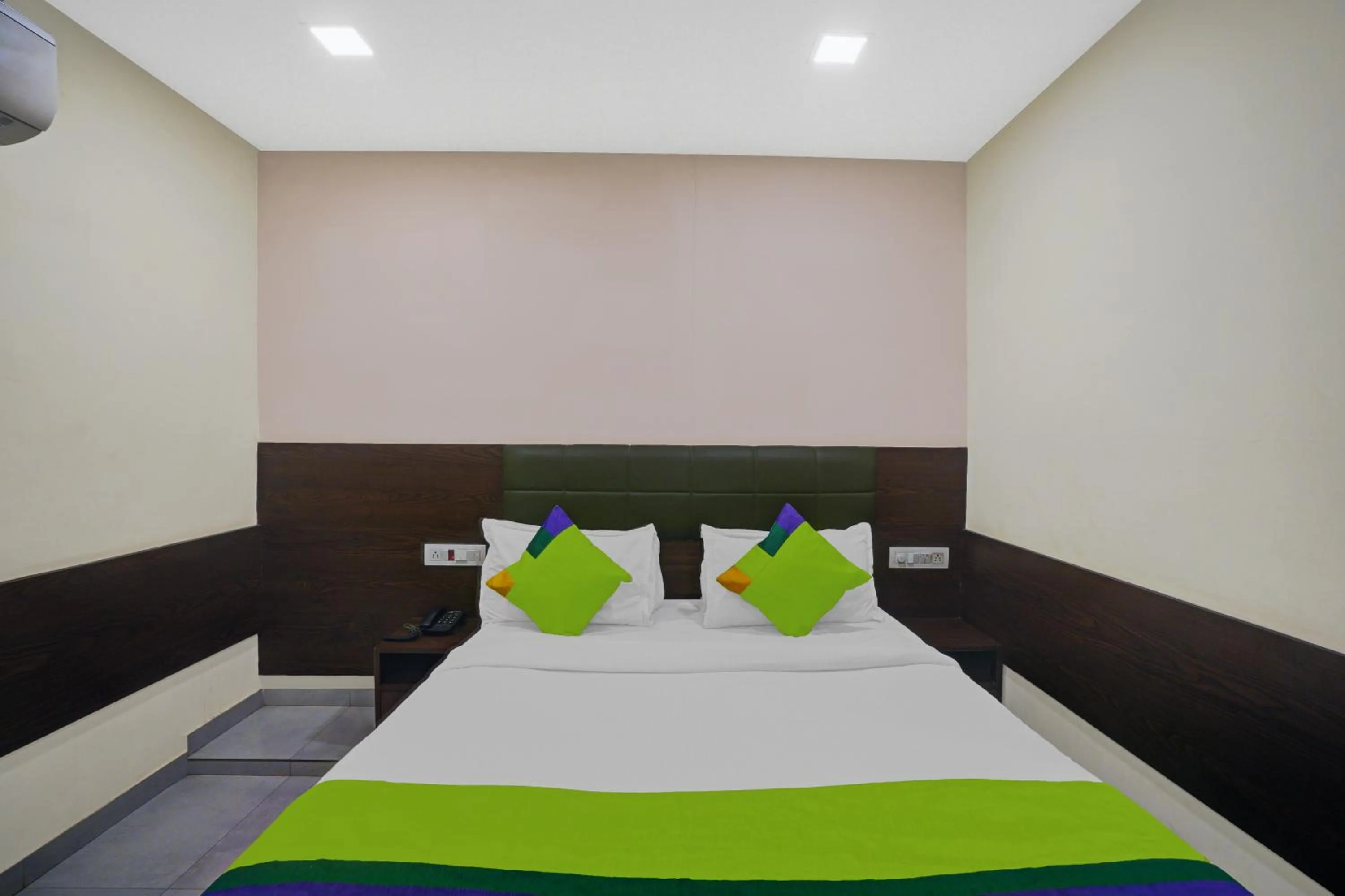 Bed in Greenotel Rooms Hazira, Surat