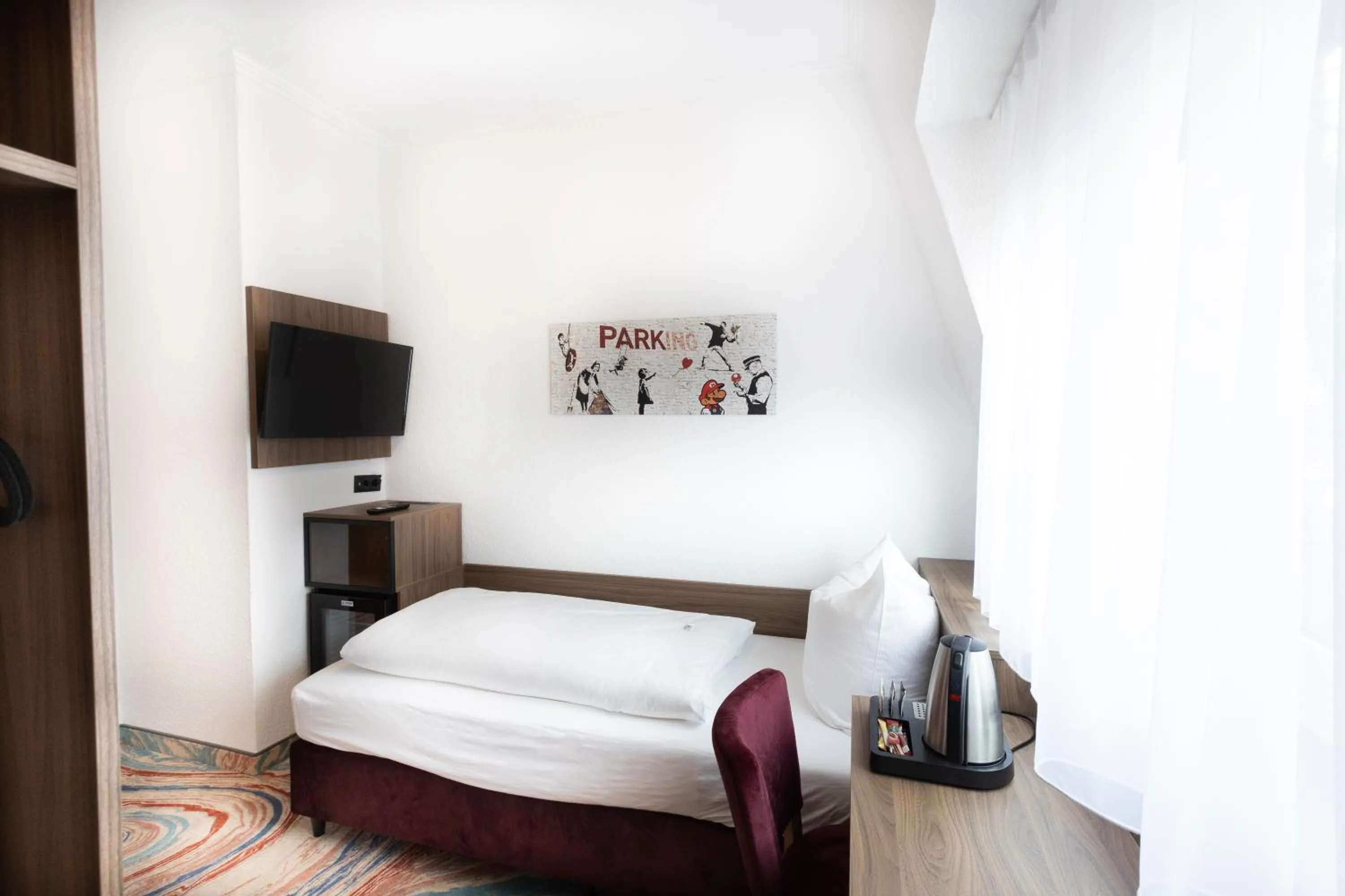 Photo of the whole room, Bed in Firzlaff's Hotel