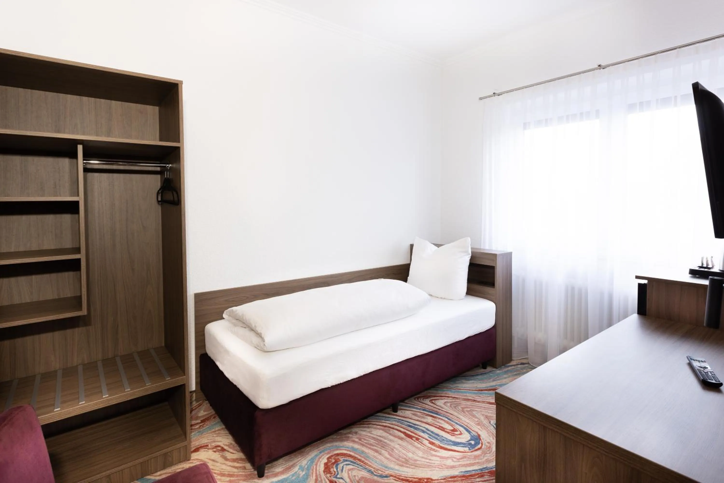 Photo of the whole room, Bed in Firzlaff's Hotel