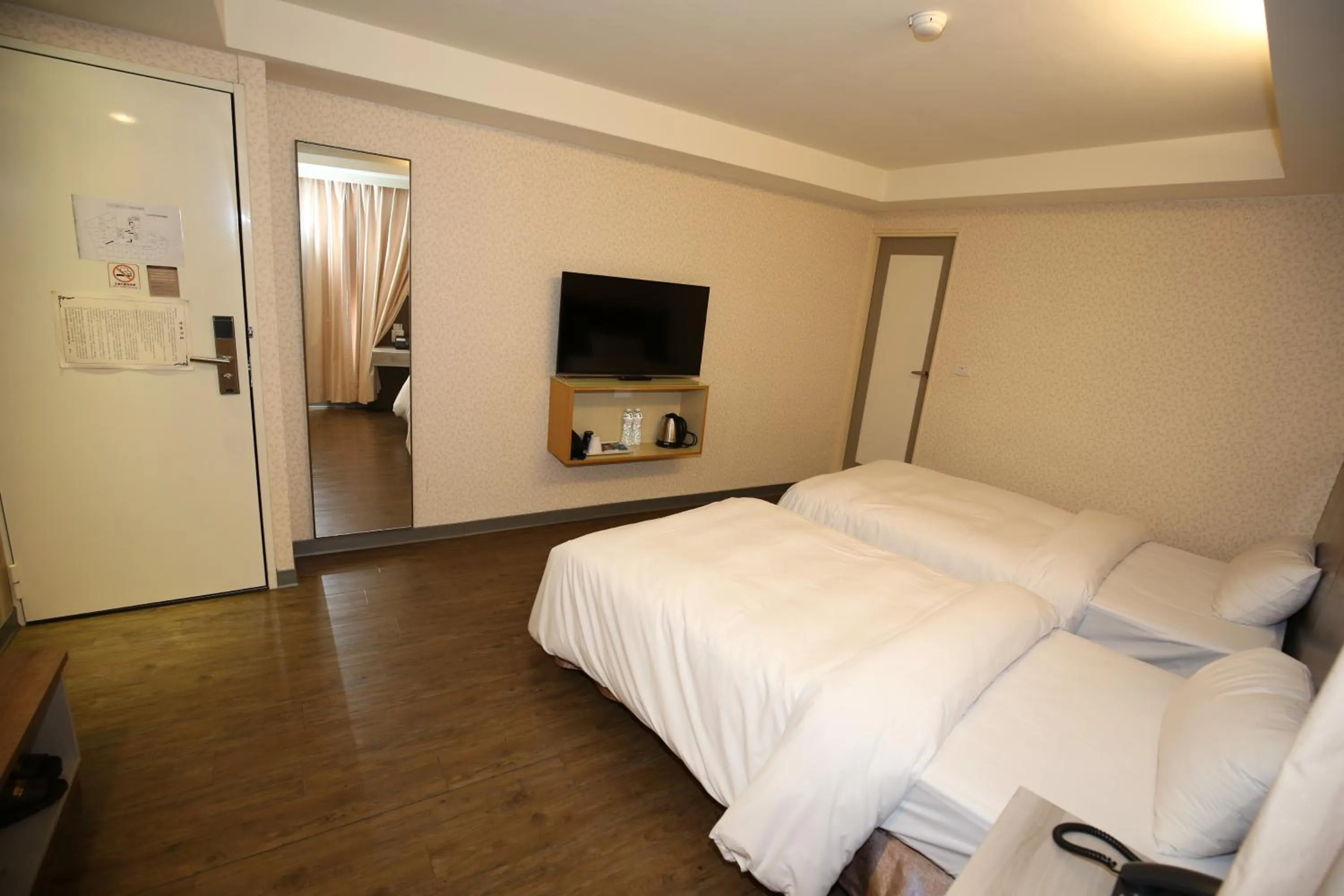 Bed in Tai Shinu Hotel