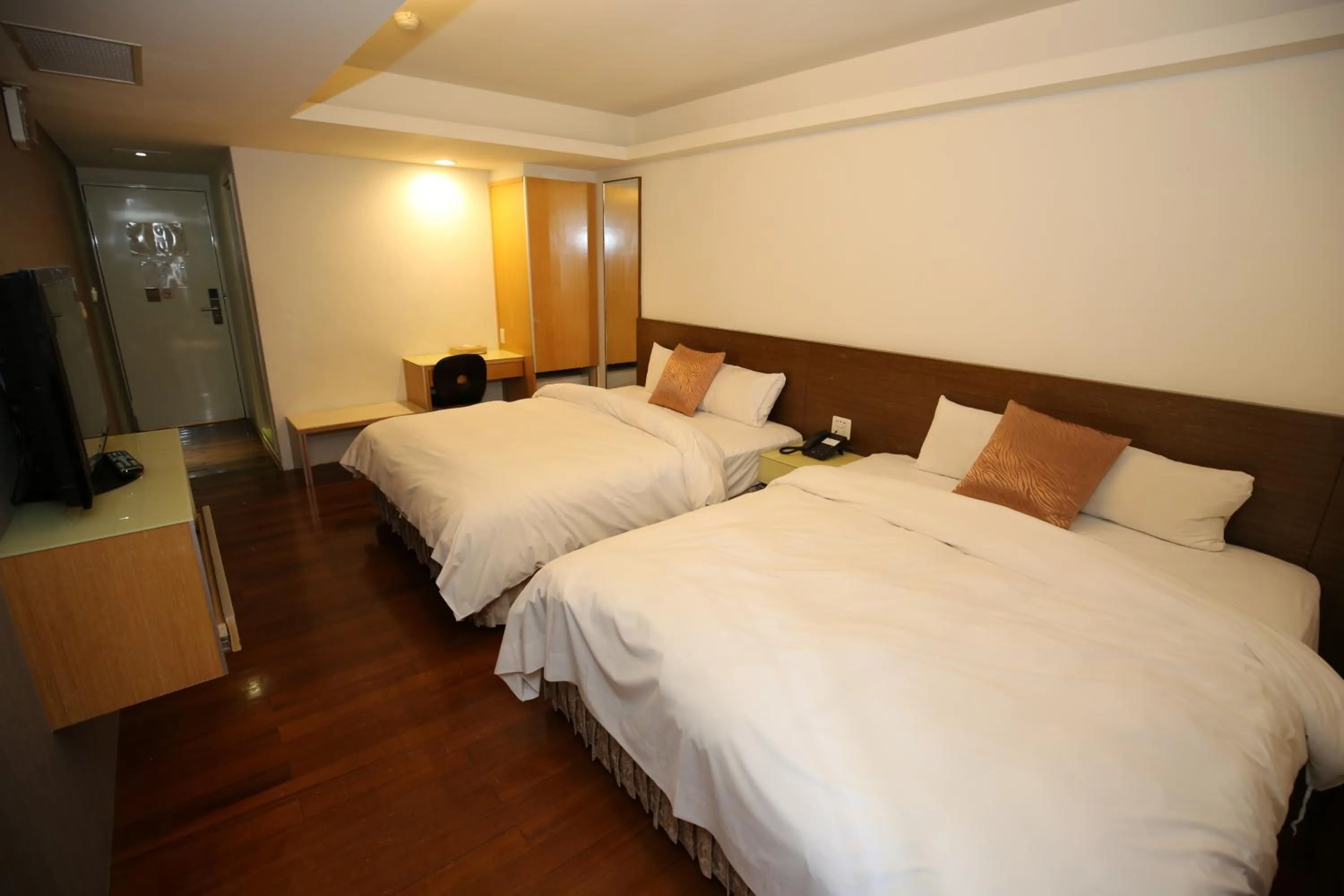 Bed in Tai Shinu Hotel