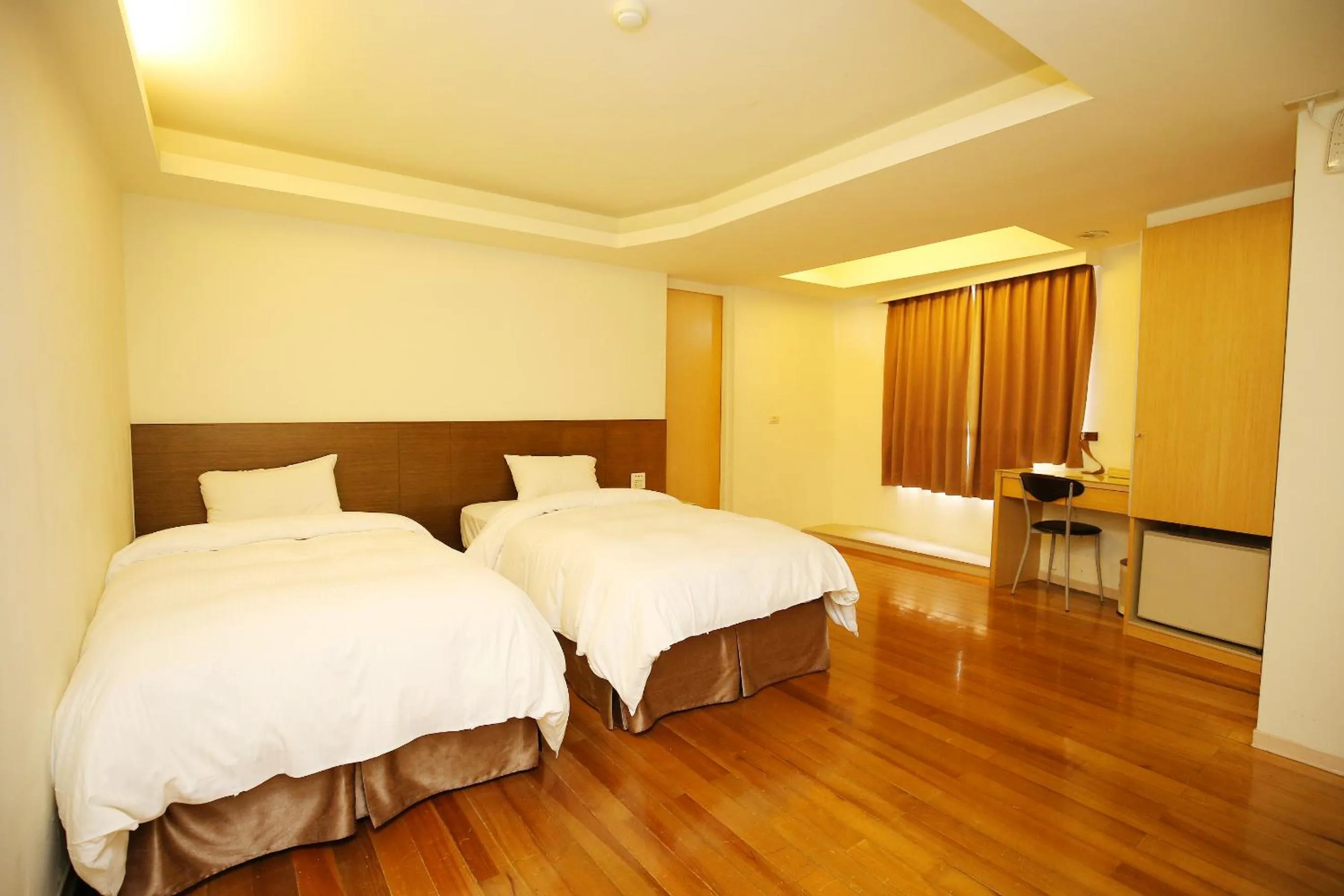 Photo of the whole room, Bed in Tai Shinu Hotel