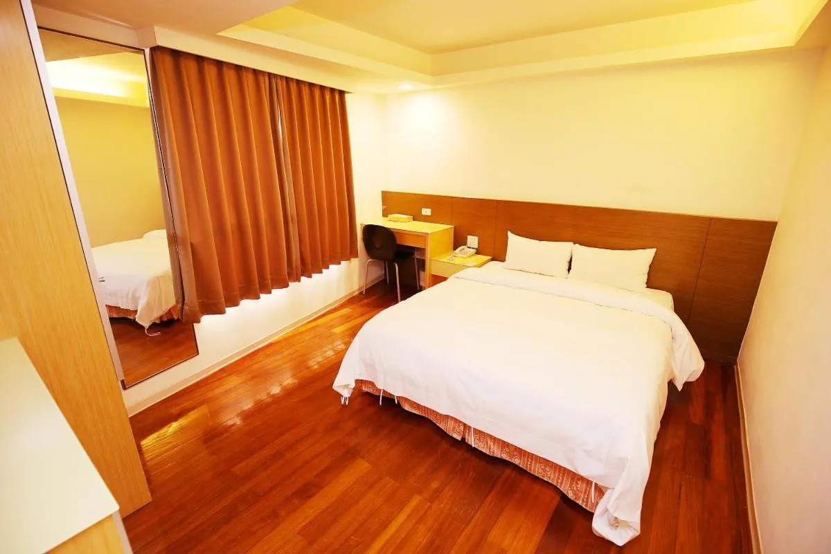 Bed in Tai Shinu Hotel