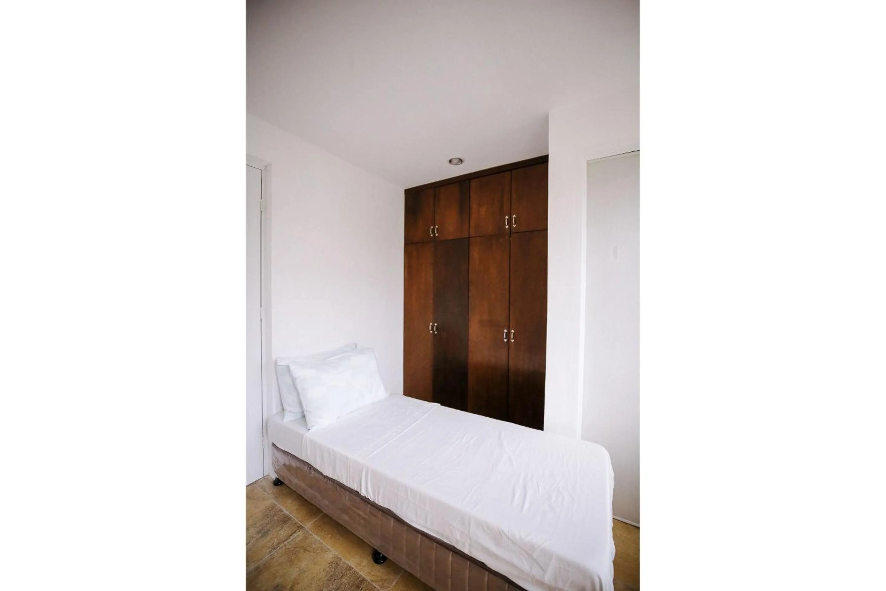 Bedroom in OYO 789 Abn Residences