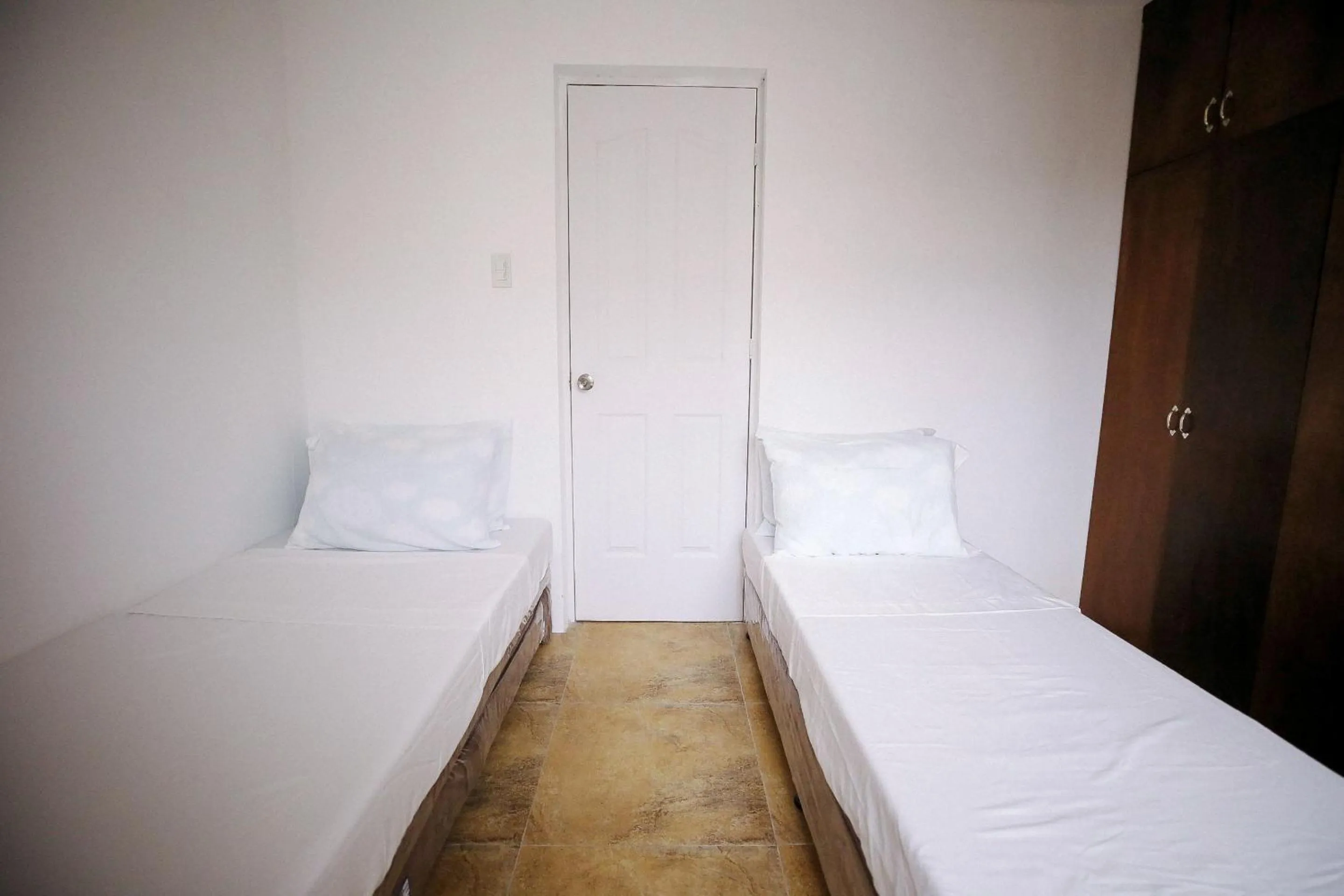 Bedroom in OYO 789 Abn Residences