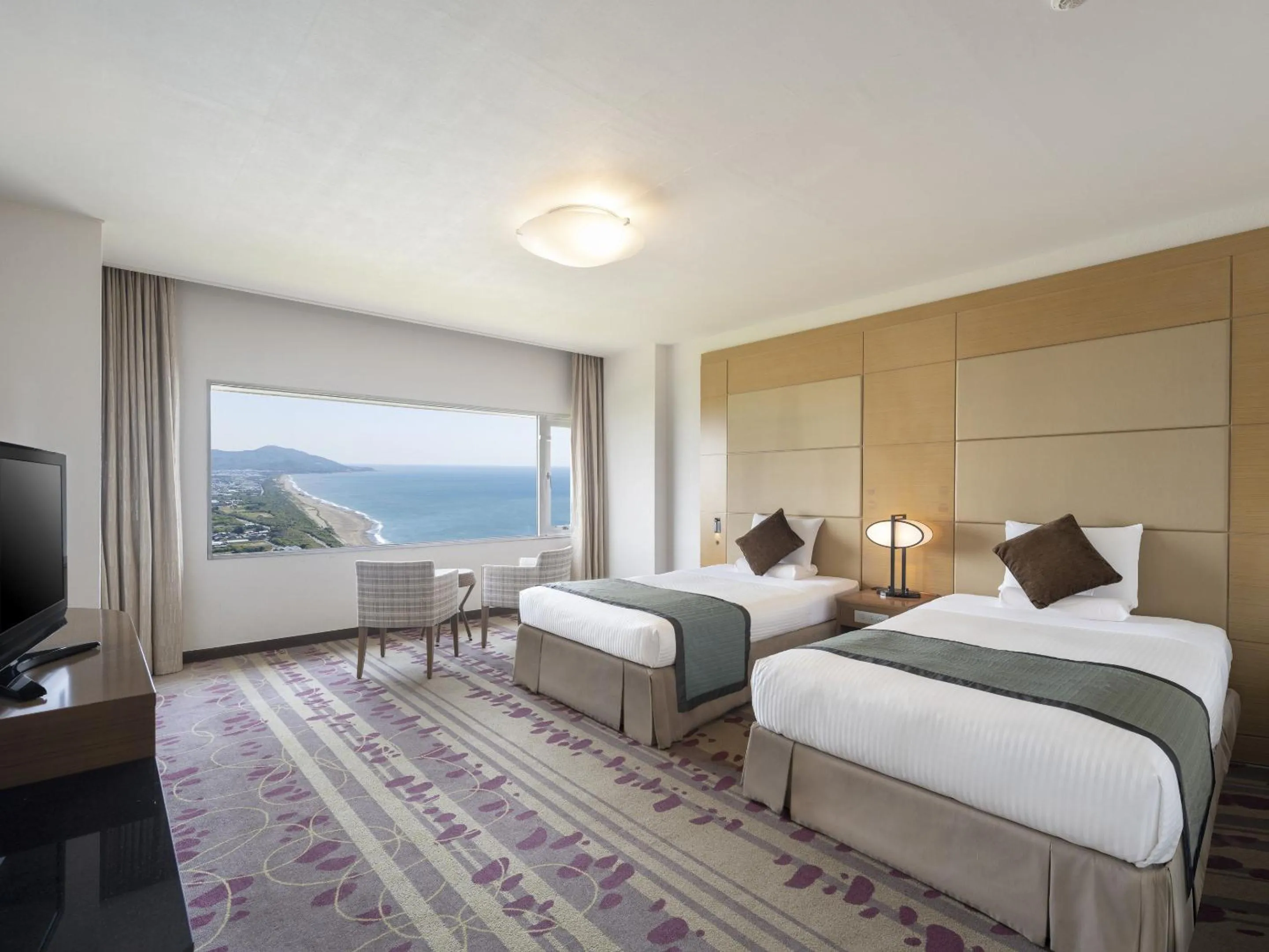 Bed in Irago Ocean Resort