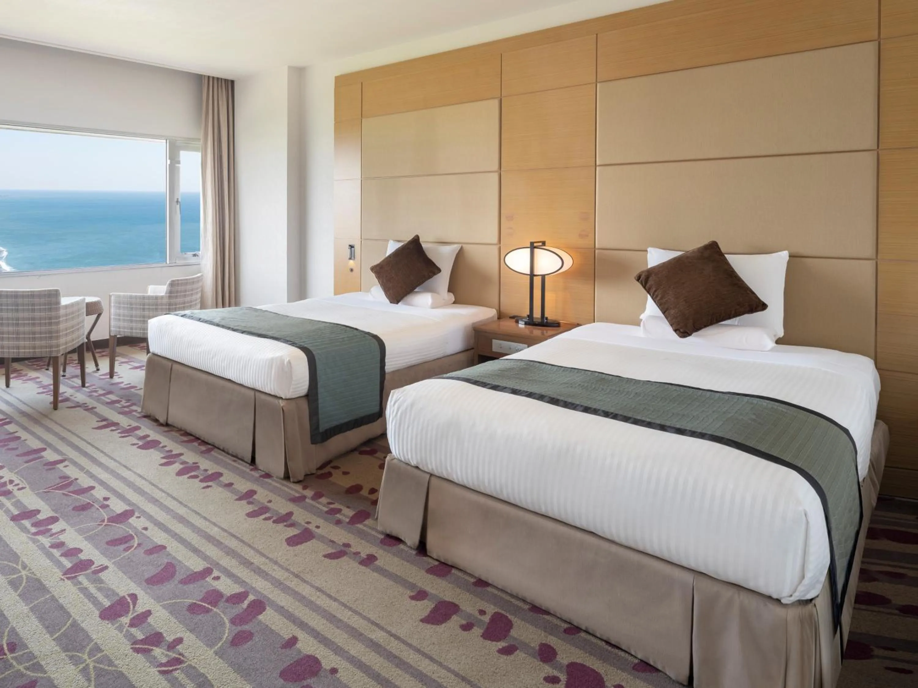 Bed in Irago Ocean Resort