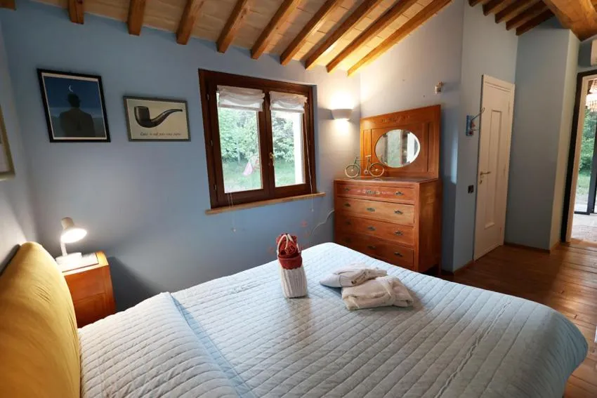 Bed in B&B and Wellness Il Pomario di Montepiglio Resort Naturista