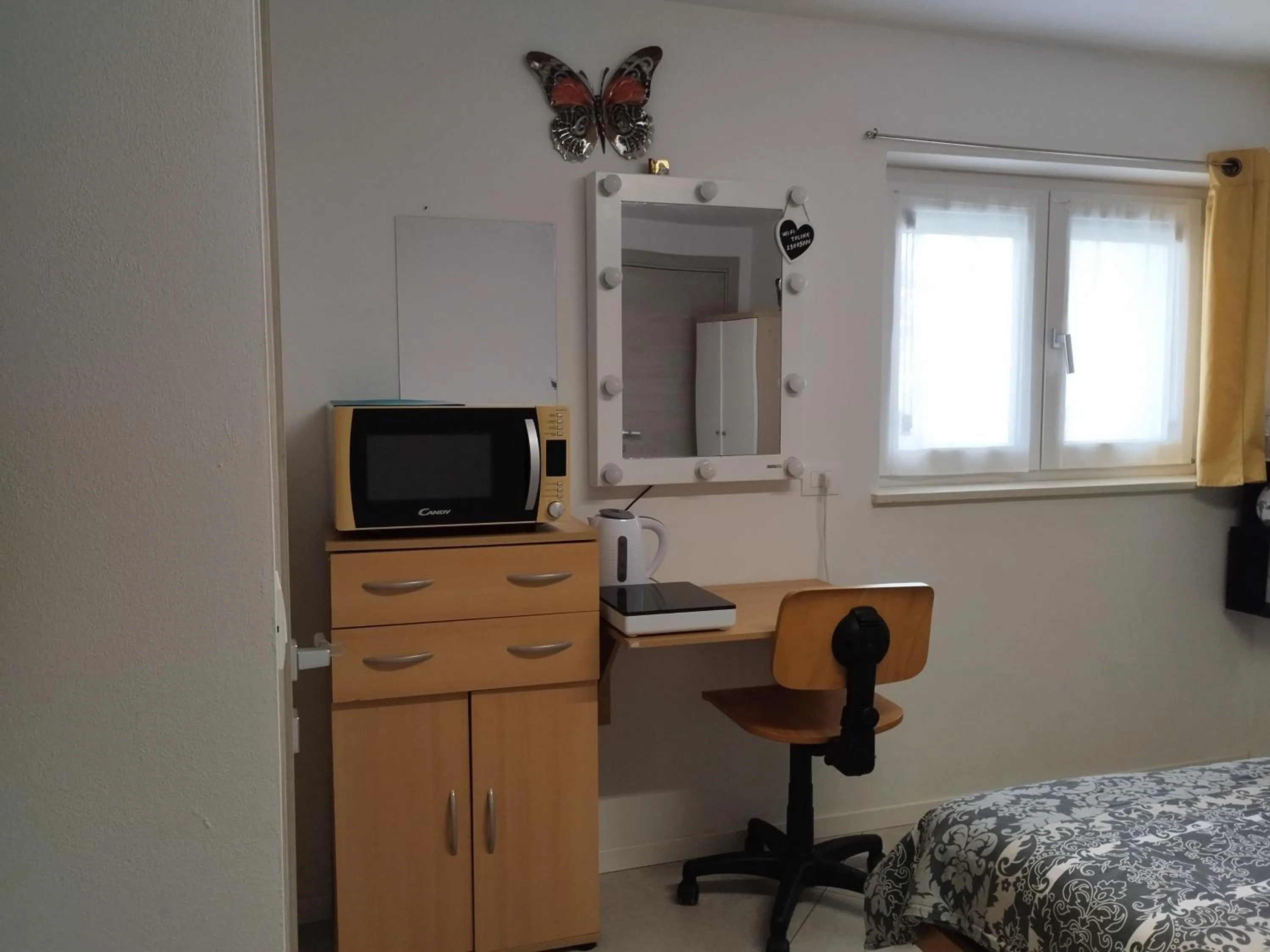Kitchen or kitchenette, Bed in Terme Apartment Levico