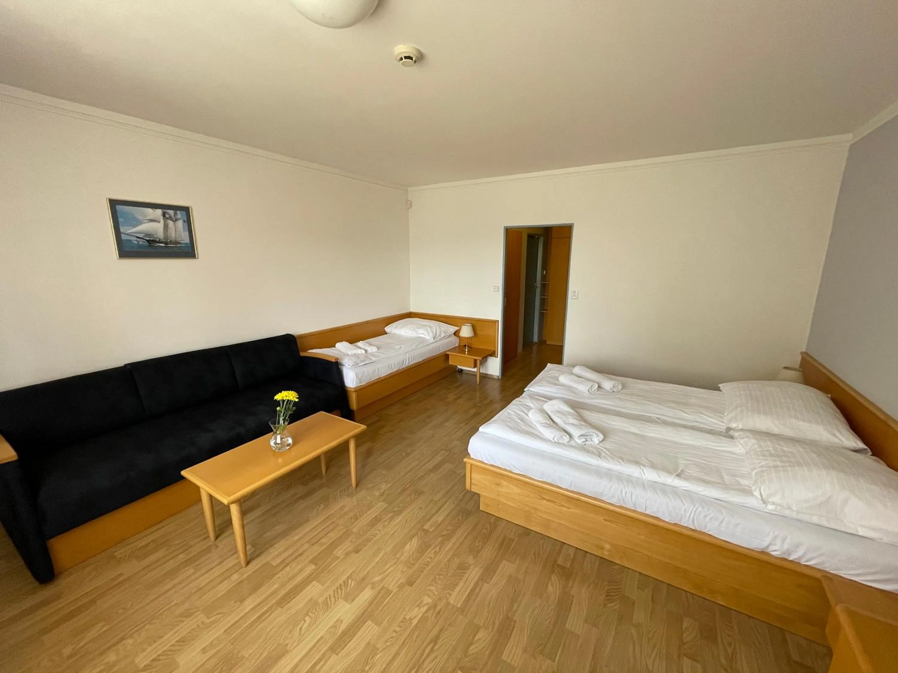 Photo of the whole room, Bed in Hotel Laguna & restaurant