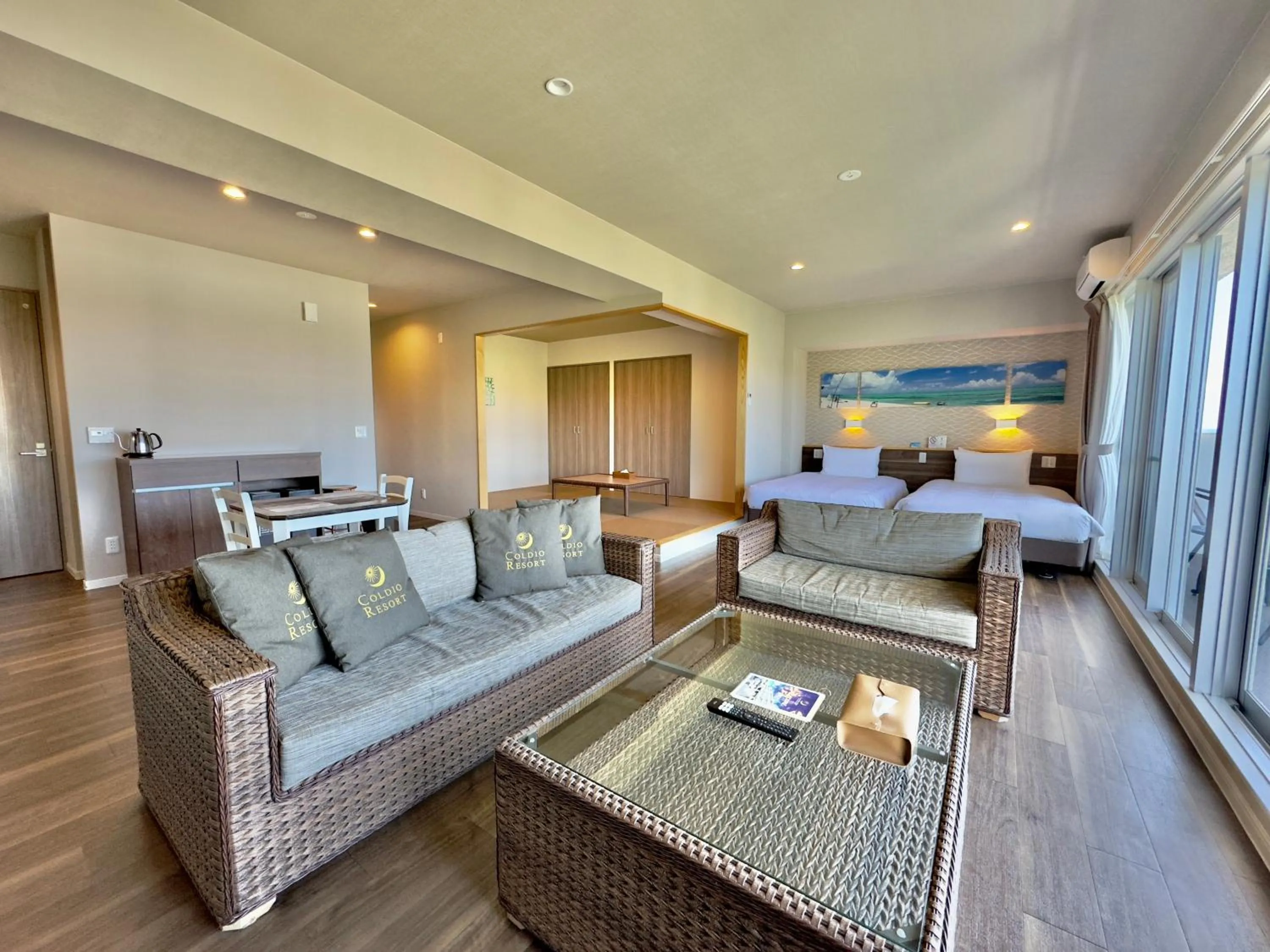 Bed in Coral Palace Onna by Sunset Avenue