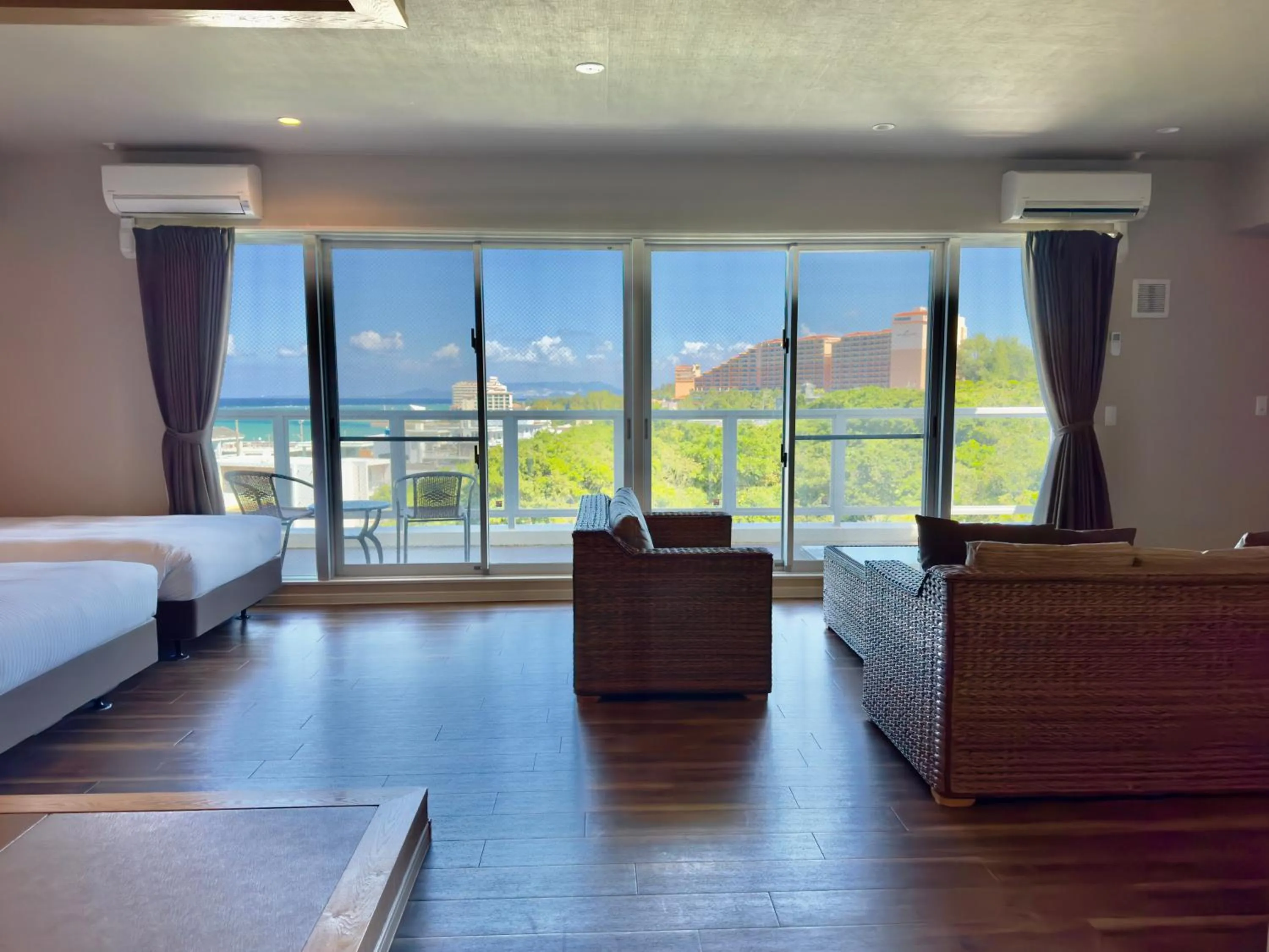 View (from property/room), Bed in Coral Palace Onna by Sunset Avenue