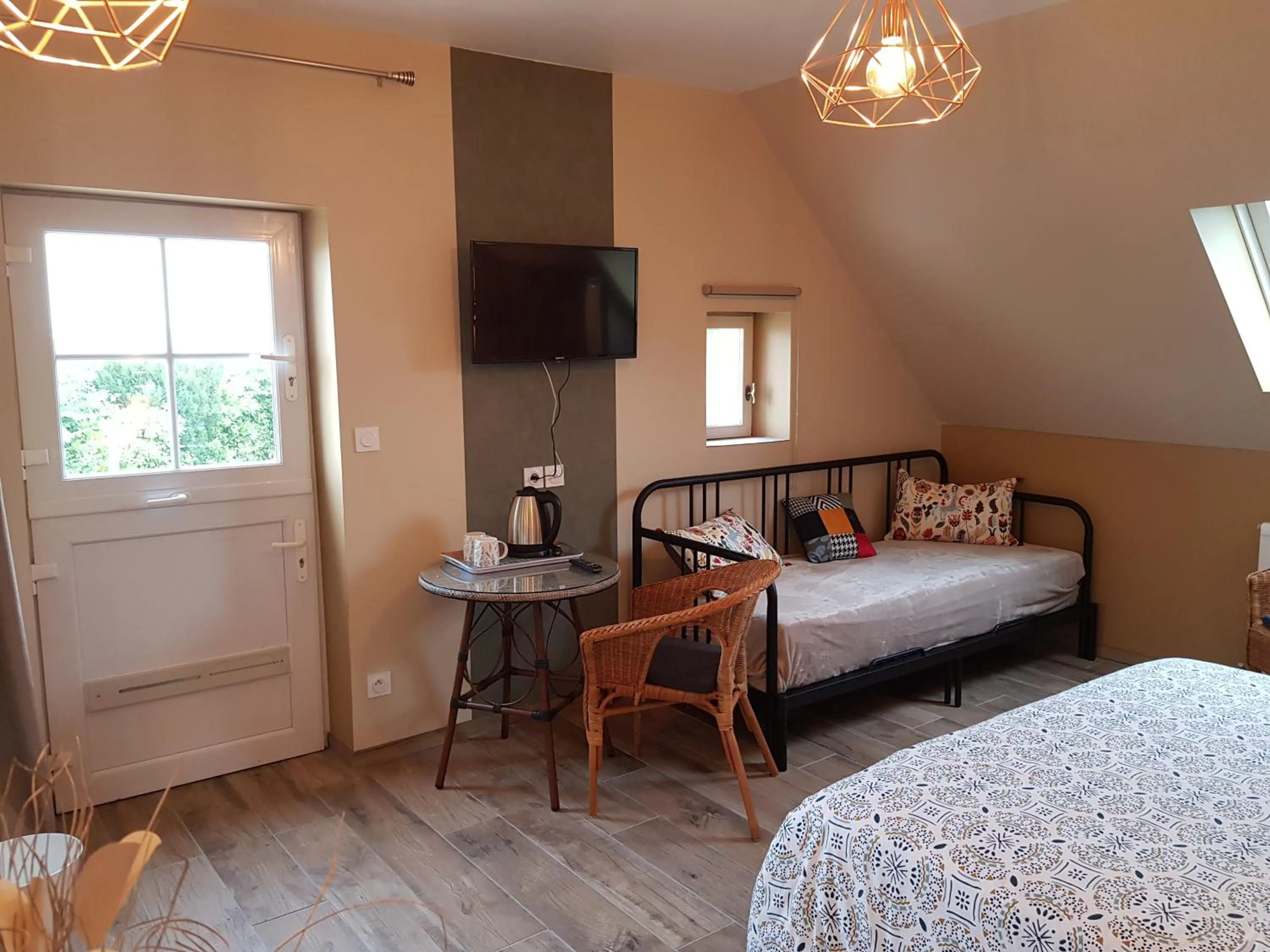 Bed in Chambres d hôtes de la Mauguinière