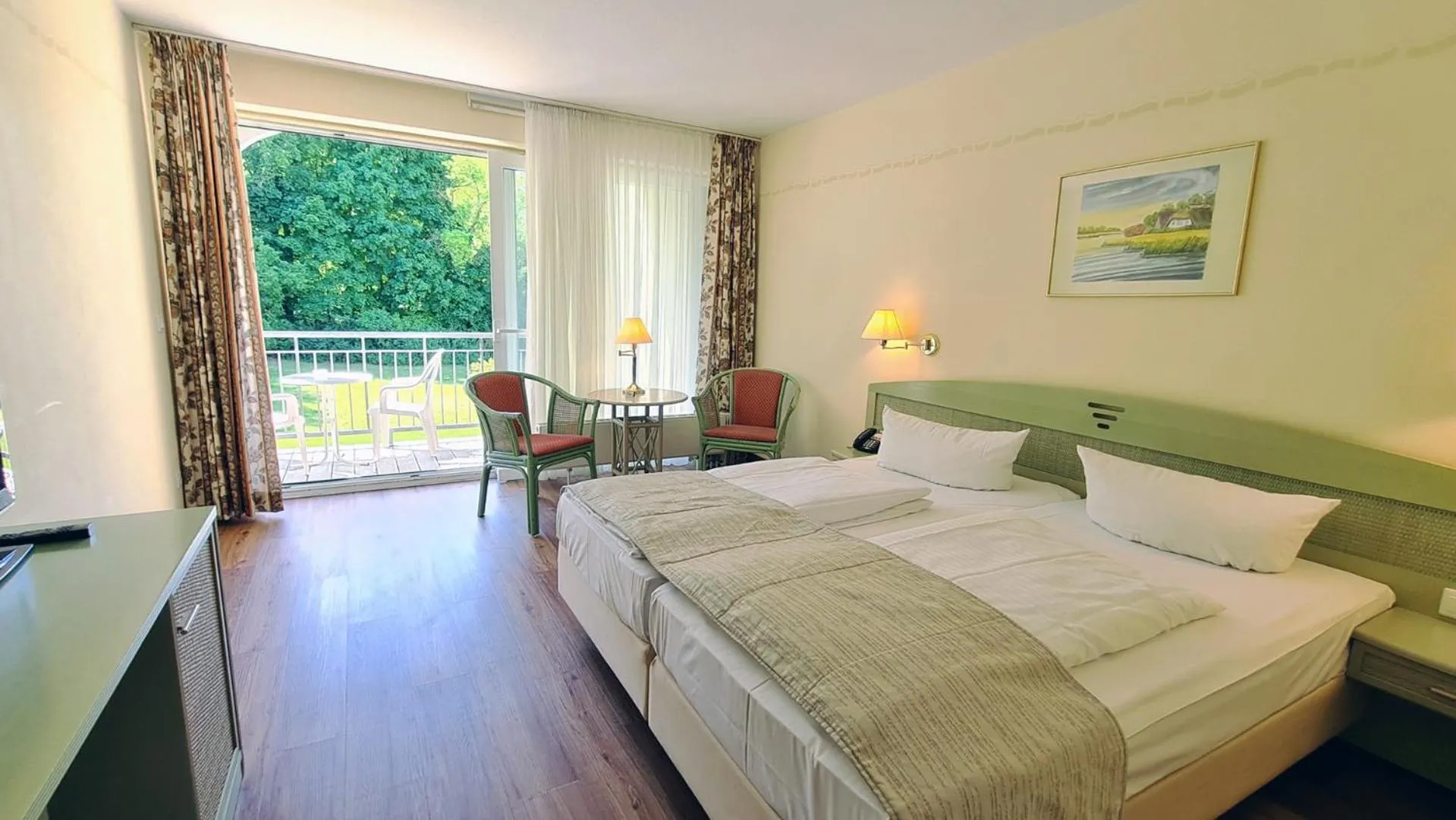 Photo of the whole room, Bed in Seehotel Schloss Klink