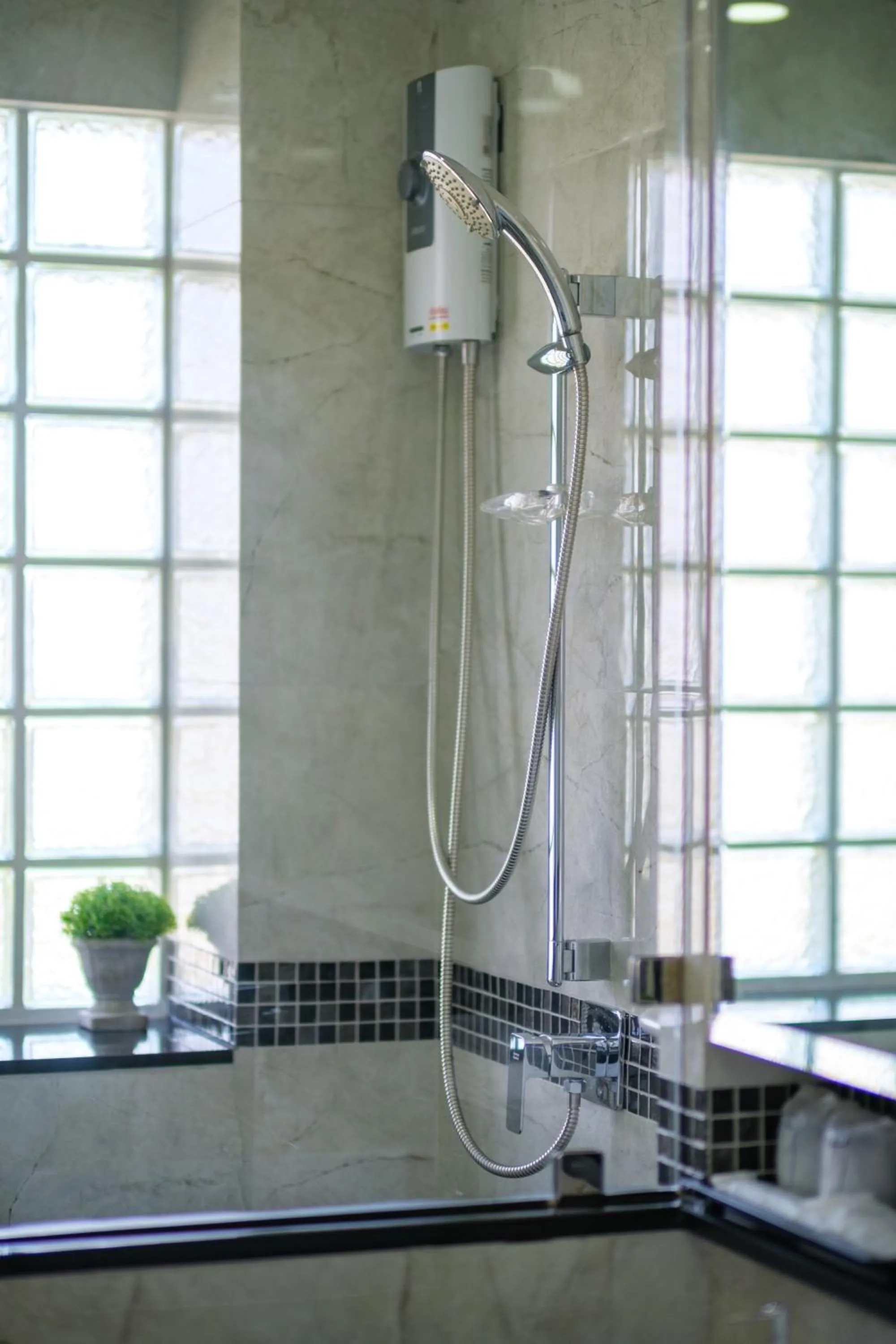 Shower in Seastar Hotel and Service Apartment