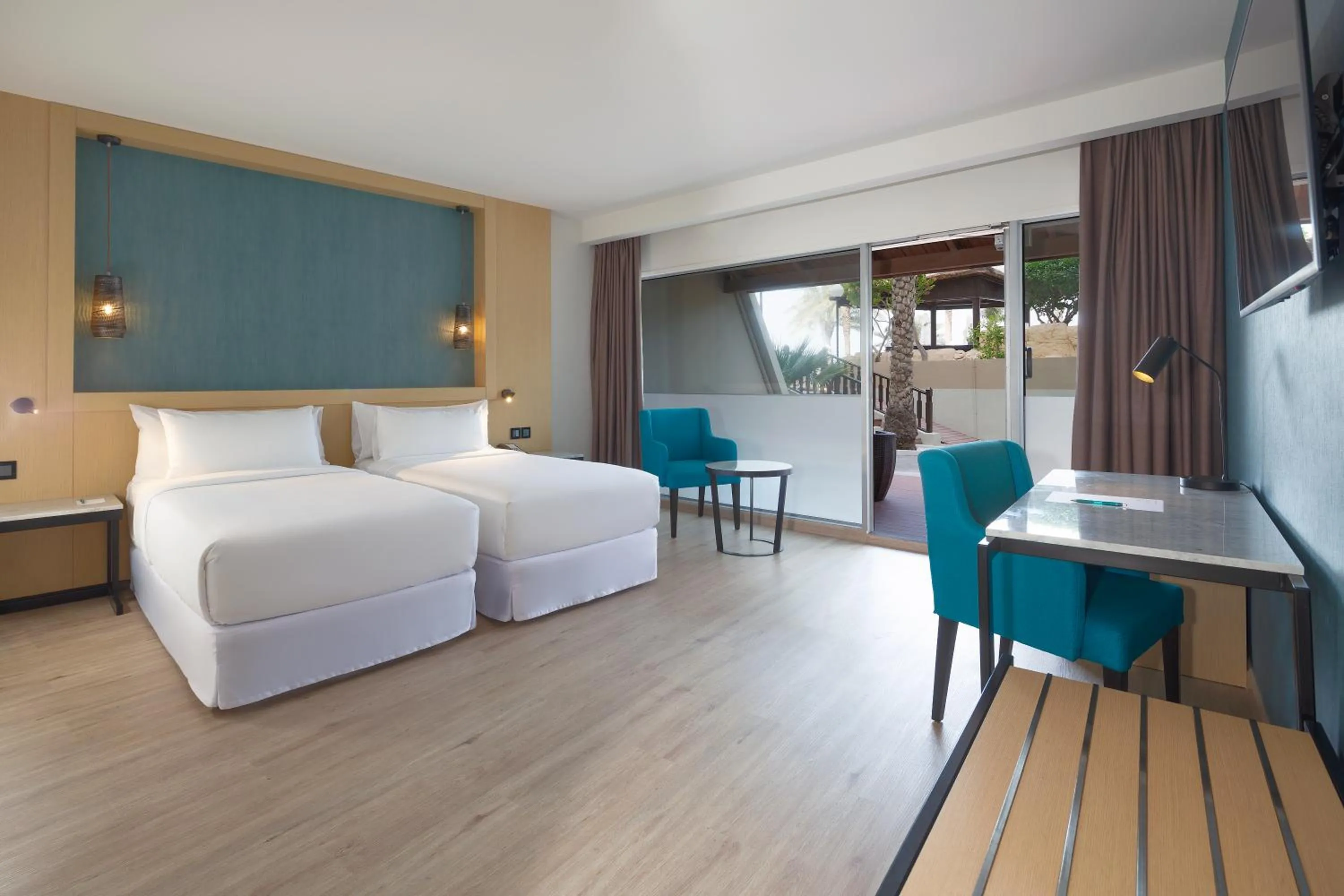 Photo of the whole room, Bed in Occidental Sharjah Grand