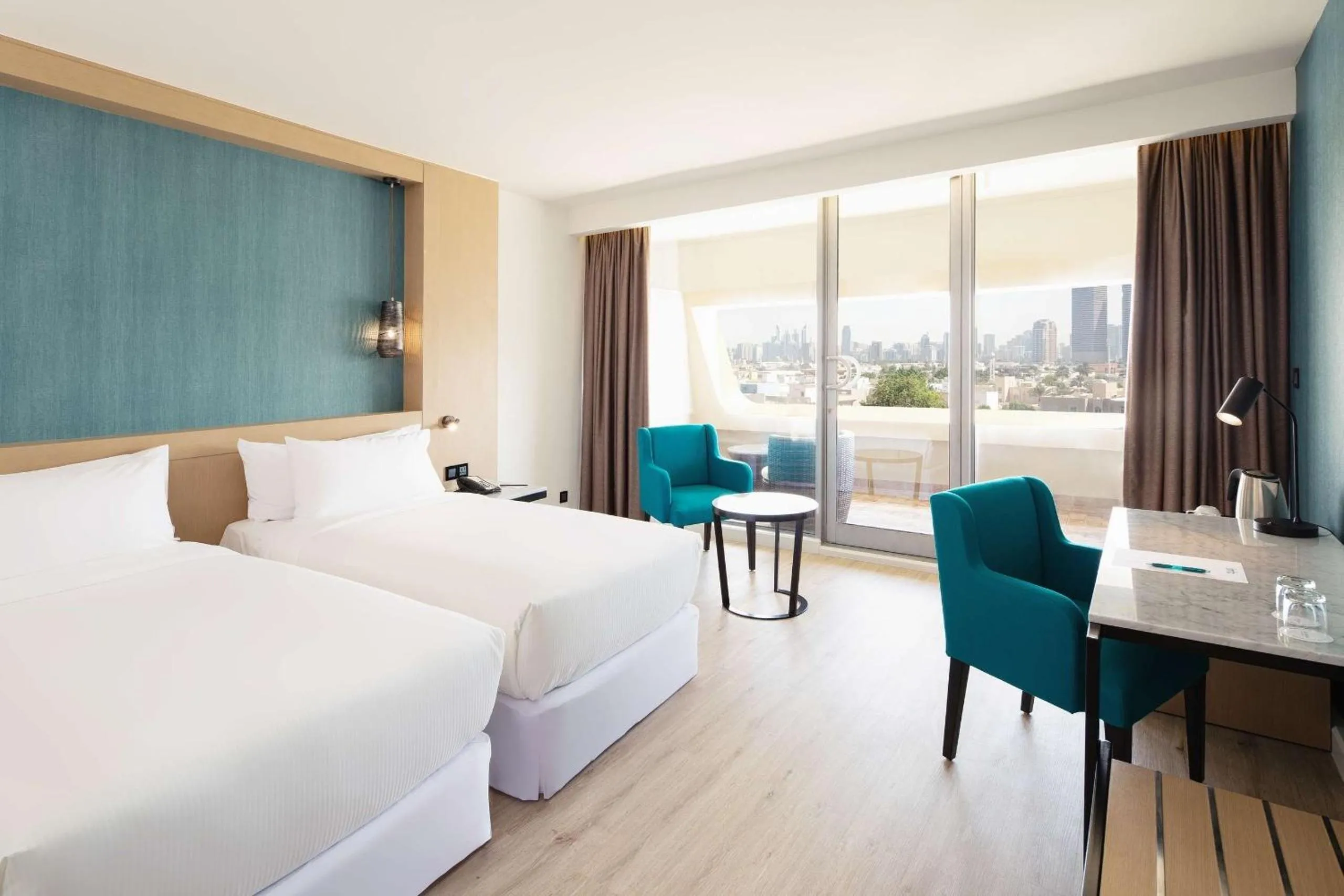 Deluxe City View with balcony in Occidental Sharjah Grand