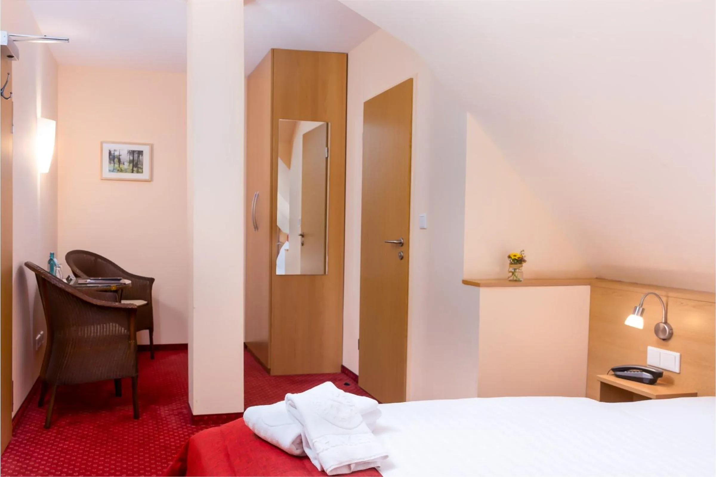 Photo of the whole room, Bed in Waldhotel Schinkenwirt