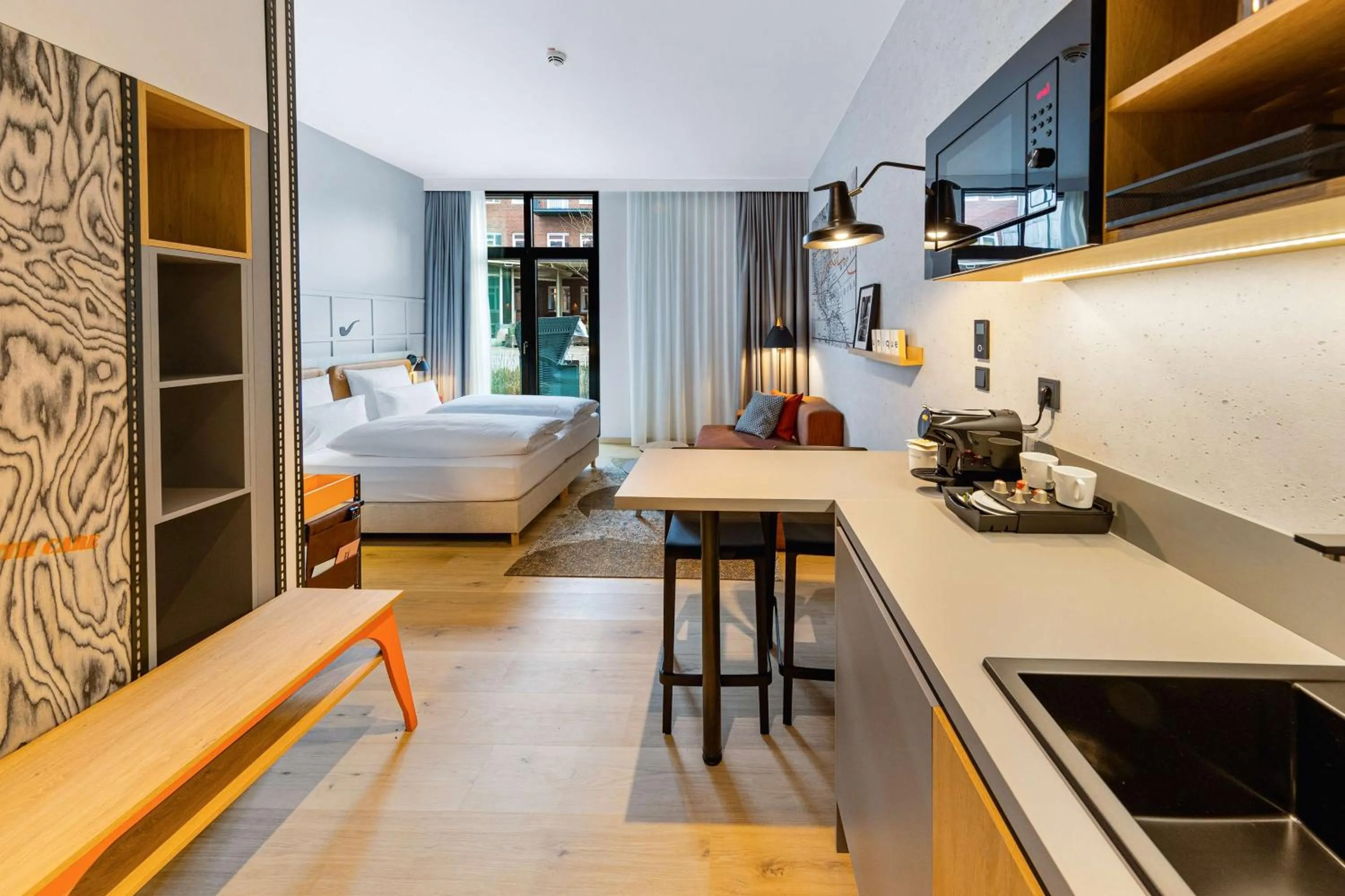 Photo of the whole room, Bed in unique by ATLANTIC Hotels Bremen