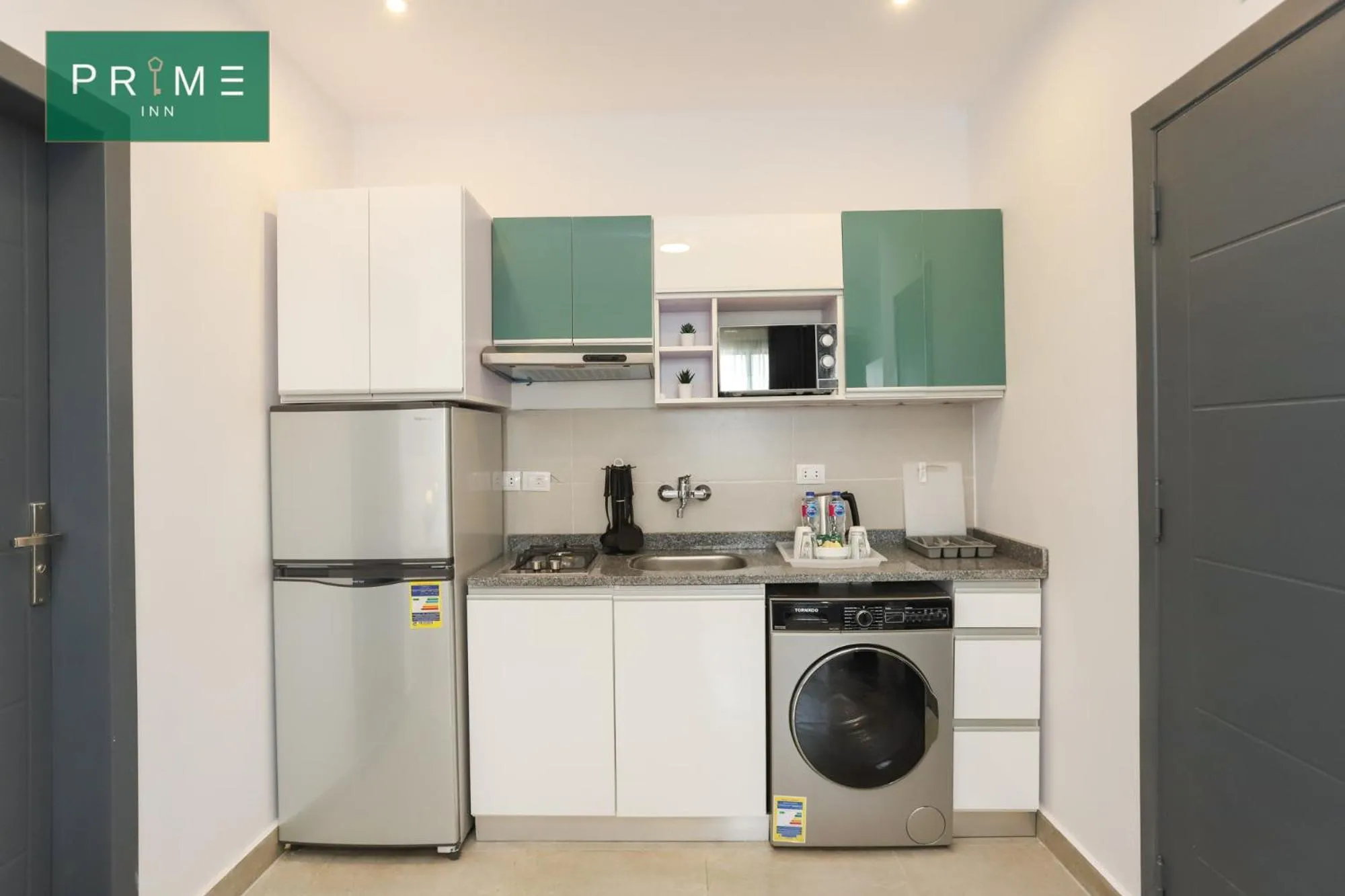 Kitchen or kitchenette in Prime Inn 10th Of Ramadan