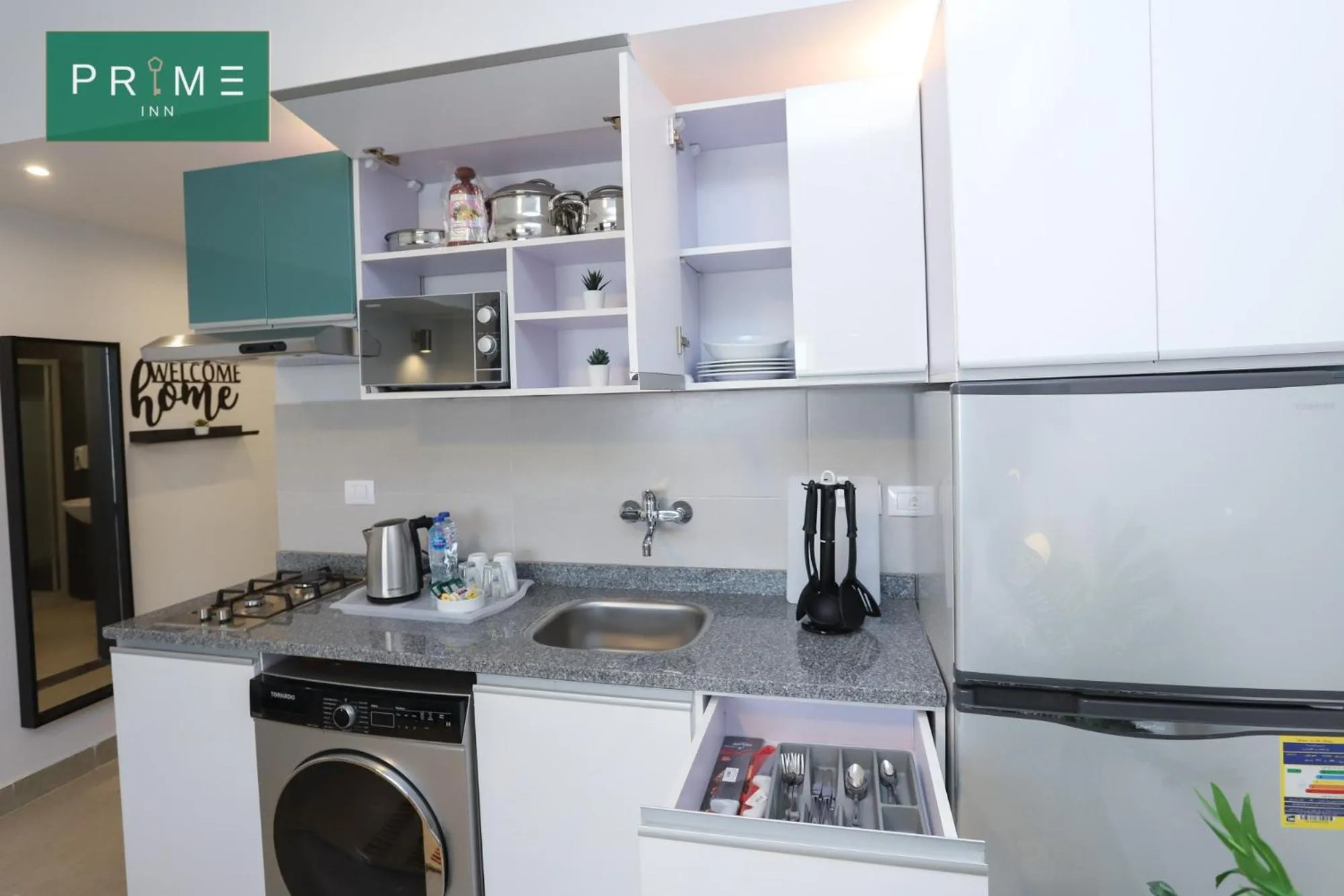 Kitchen or kitchenette in Prime Inn 10th Of Ramadan