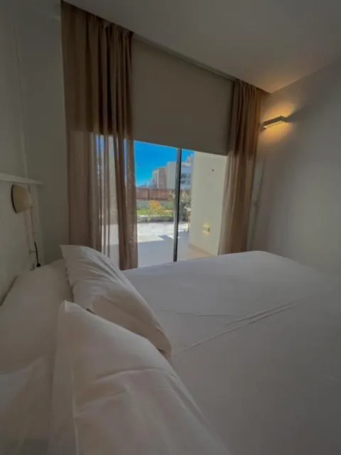 Bed in ECO-APARTMENTS LA MARINEDA