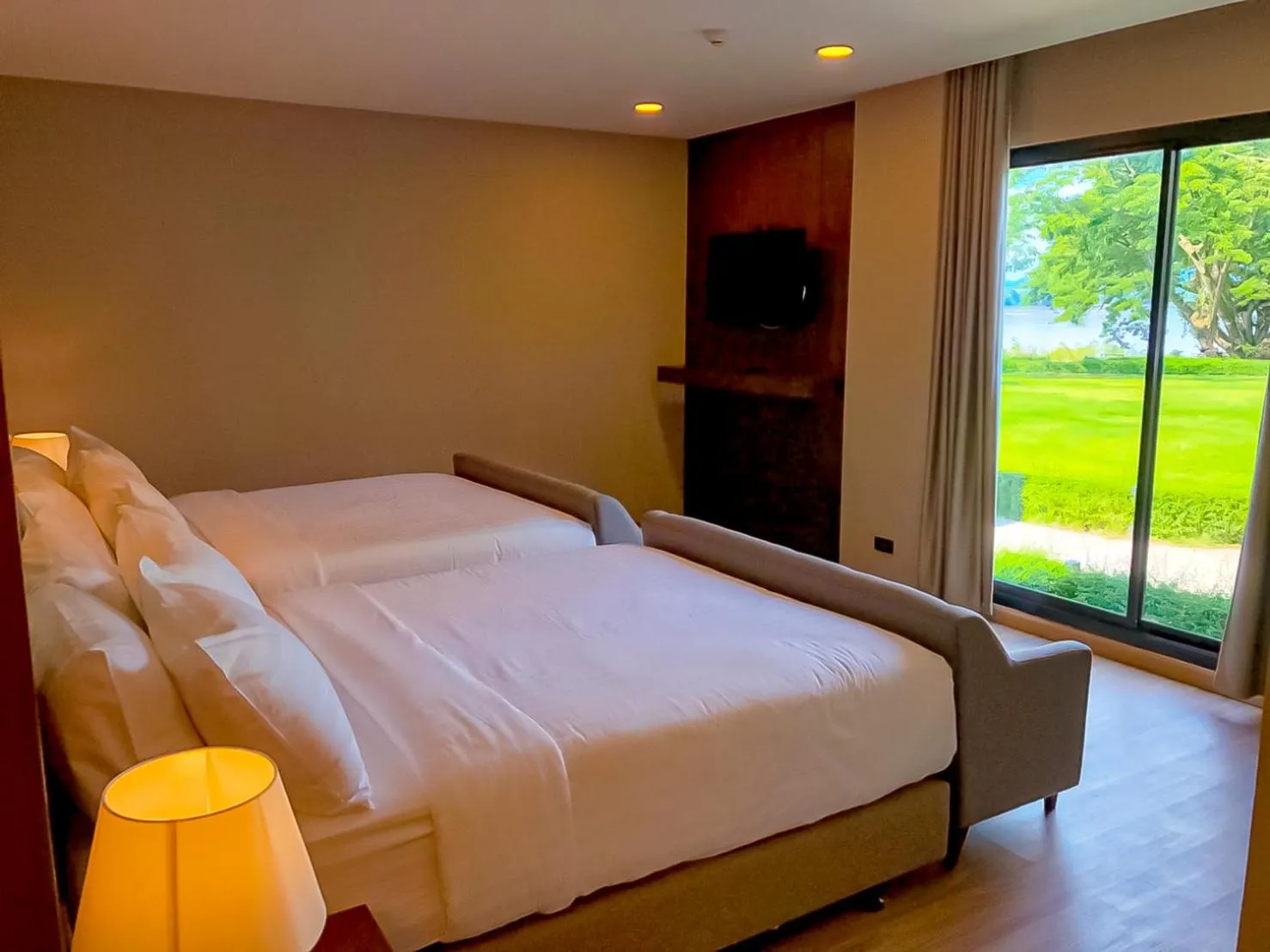 Bed in River Tree Resort