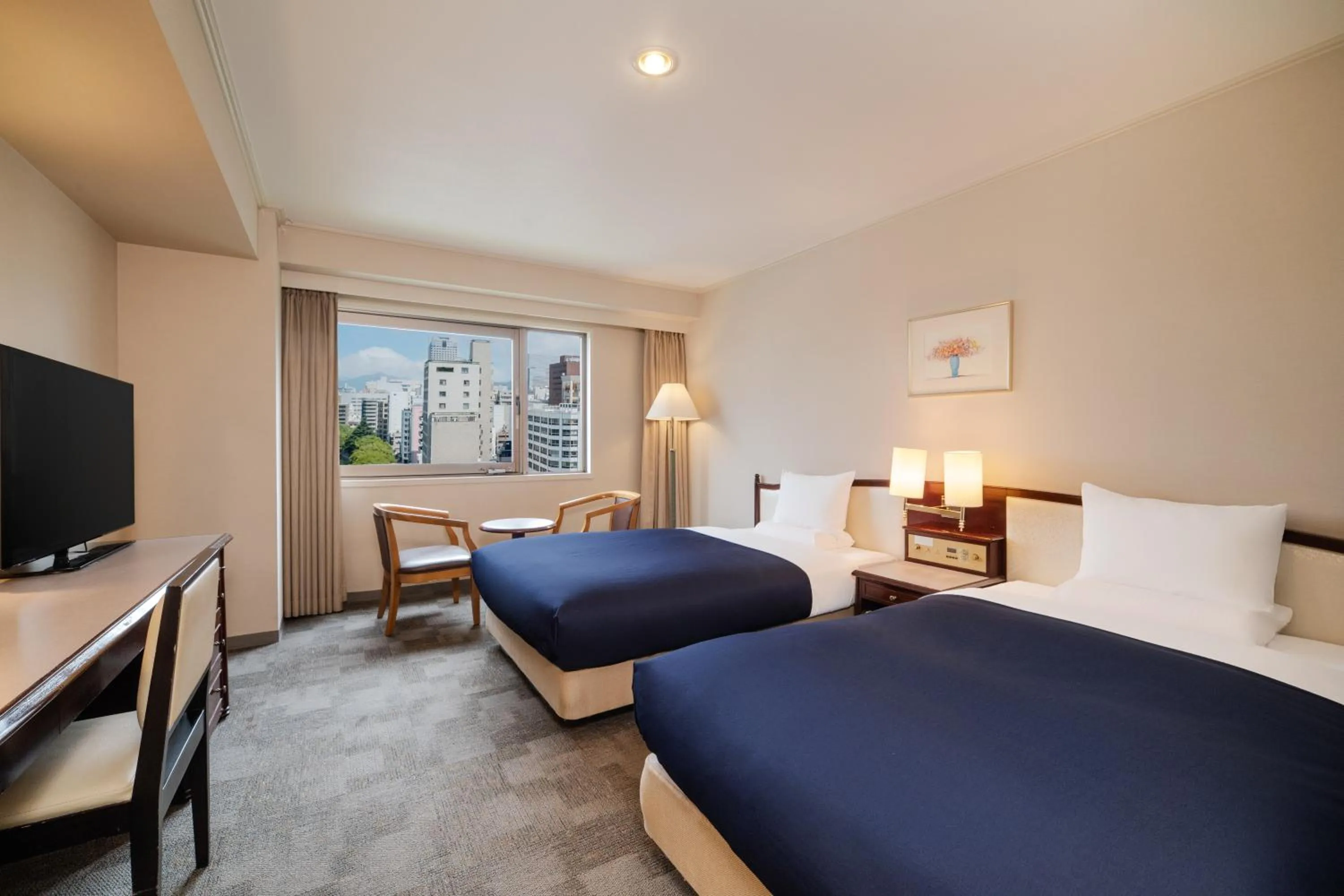 Bed in HOTEL MYSTAYS Hiroshima Peace Park