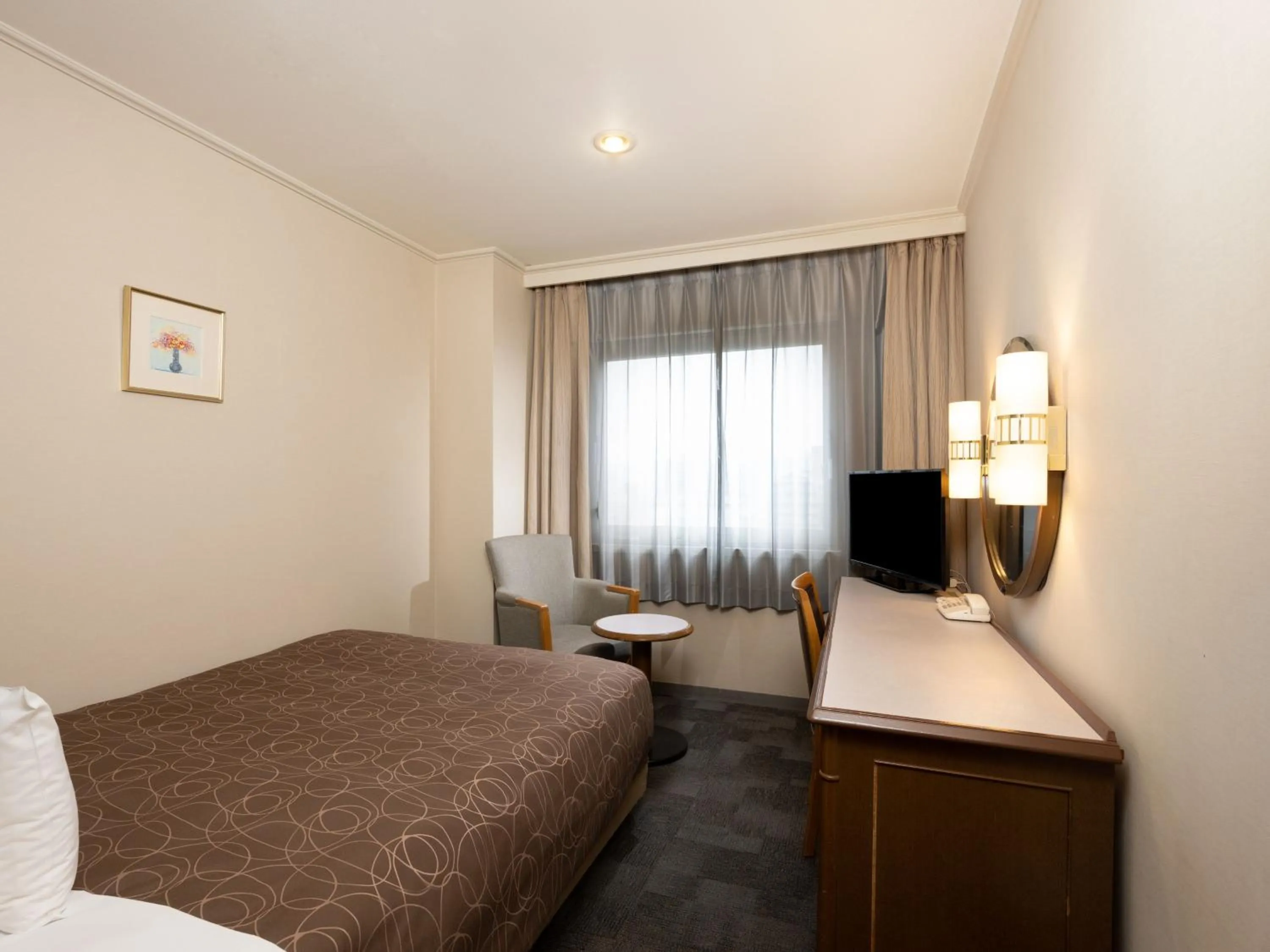 Photo of the whole room, Bed in Sotetsu Grand Fresa Hiroshima