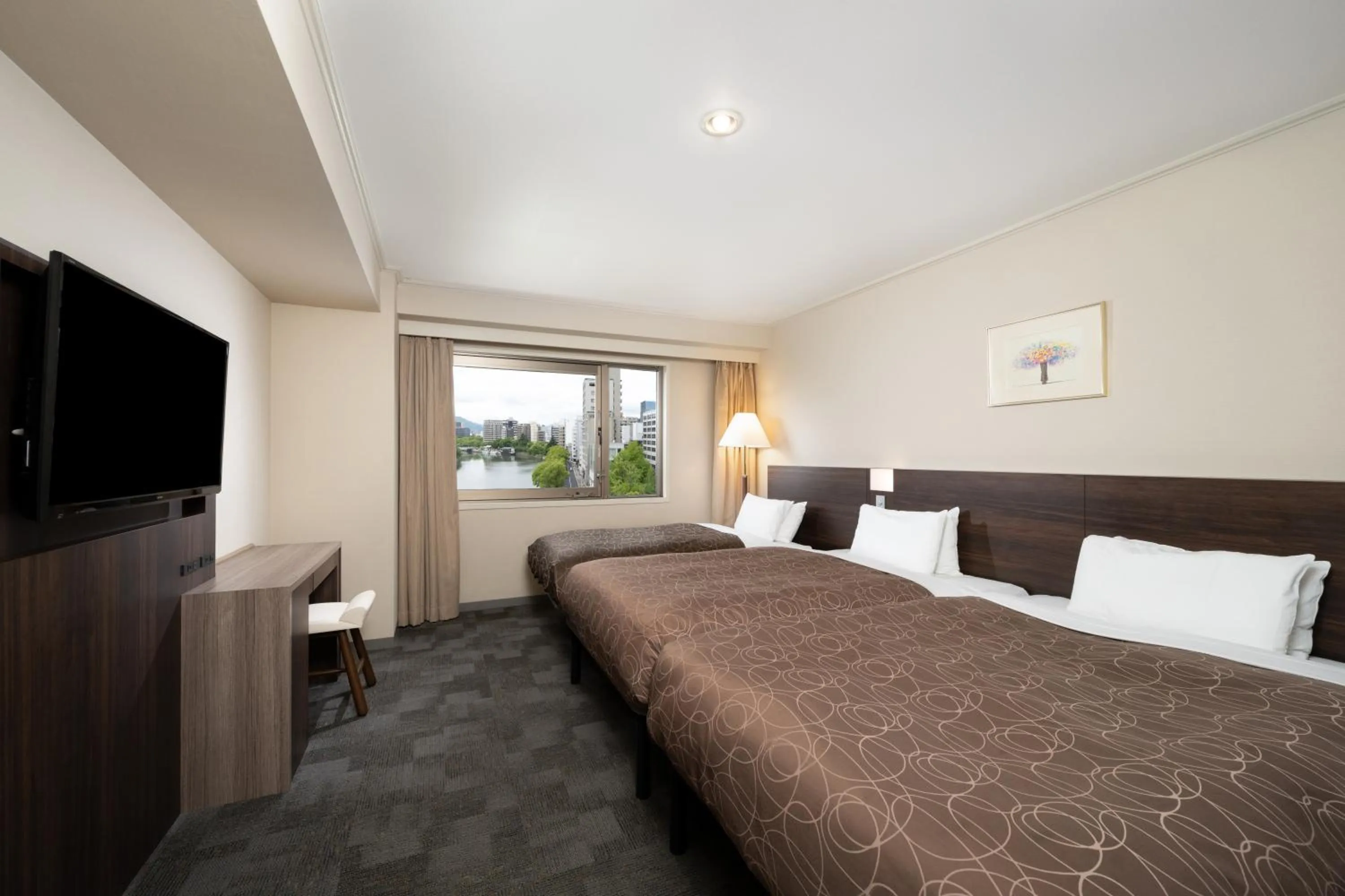 Photo of the whole room, Bed in Sotetsu Grand Fresa Hiroshima