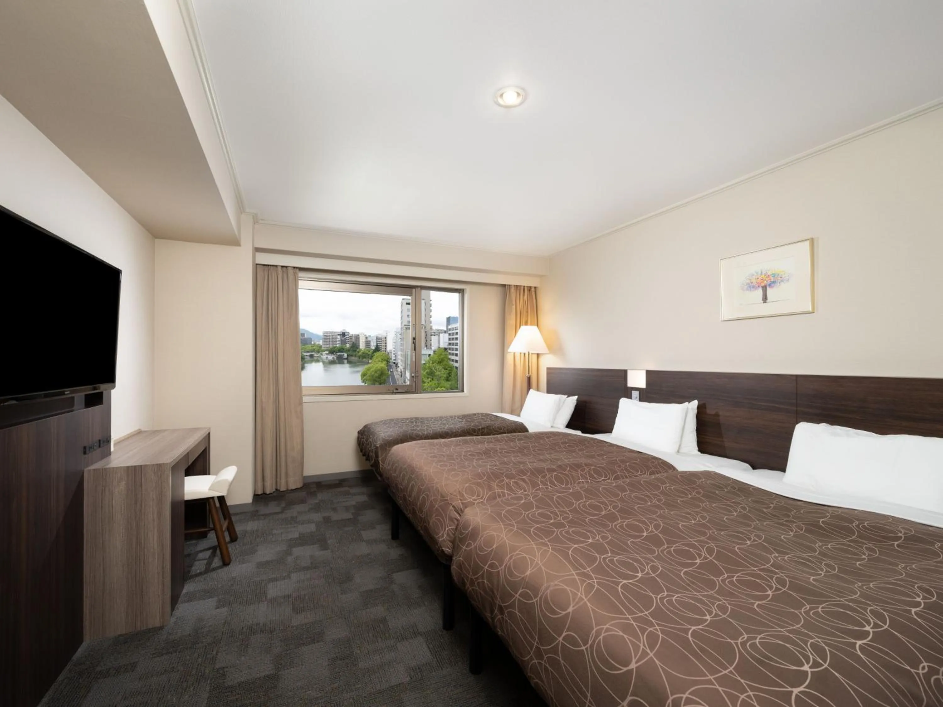 Photo of the whole room, Bed in Sotetsu Grand Fresa Hiroshima