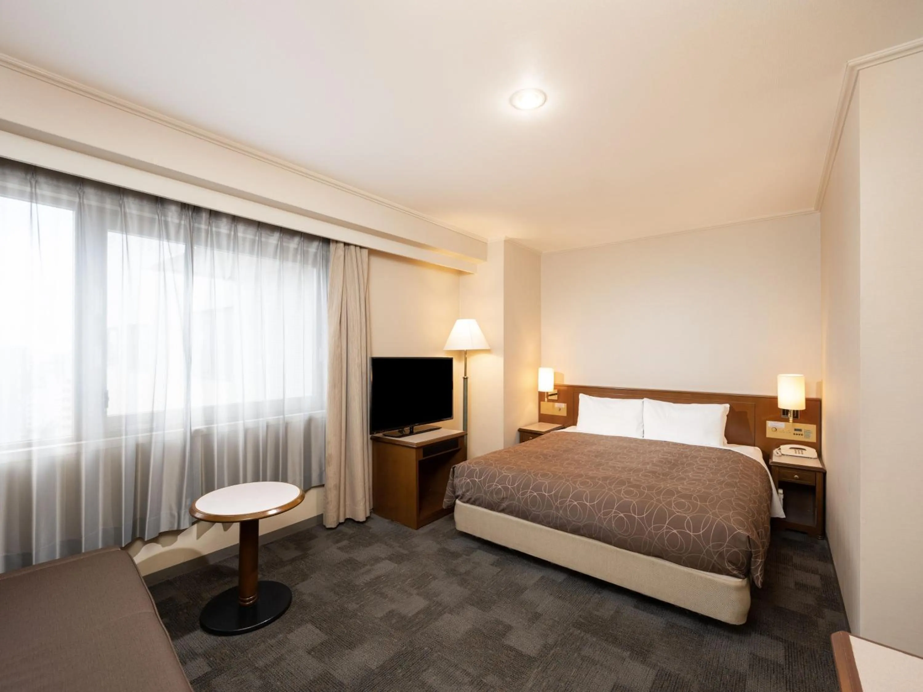Photo of the whole room, Bed in Sotetsu Grand Fresa Hiroshima