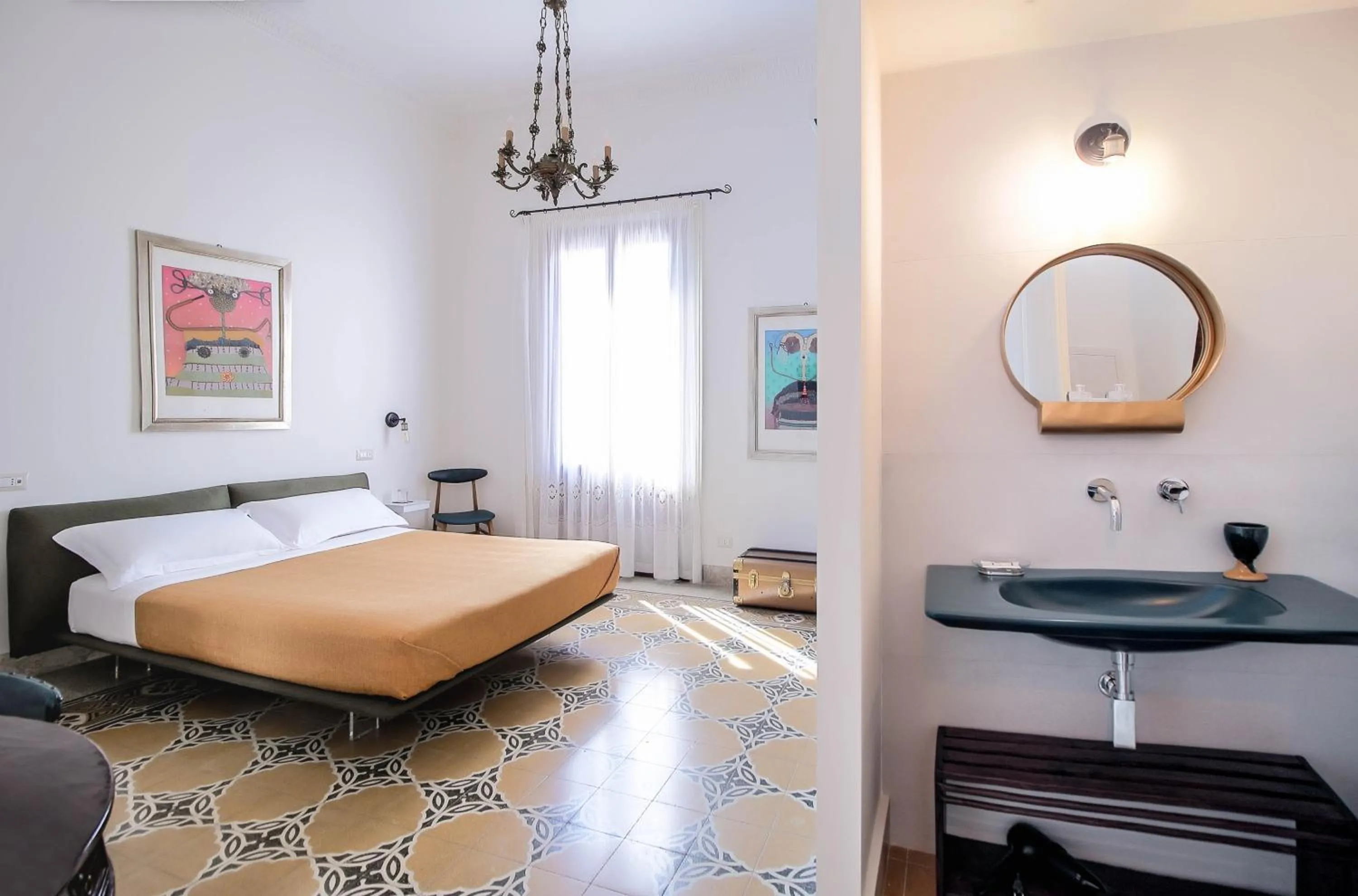 Bed in DOMUS ALERIA Deluxe Rooms