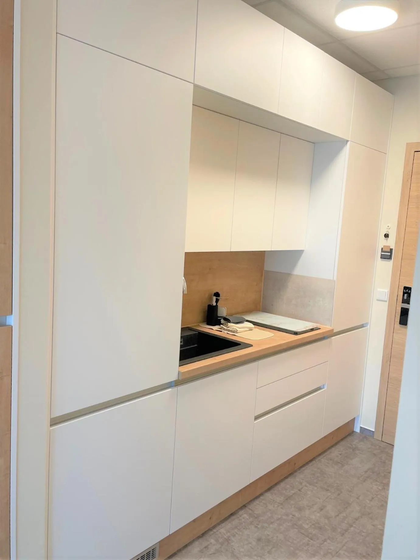 kitchen in LikeDaheim Apartments