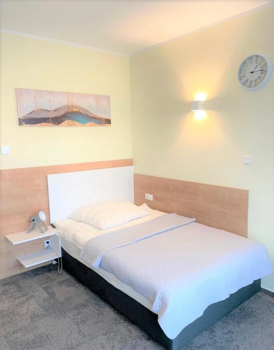 Bed in LikeDaheim Apartments