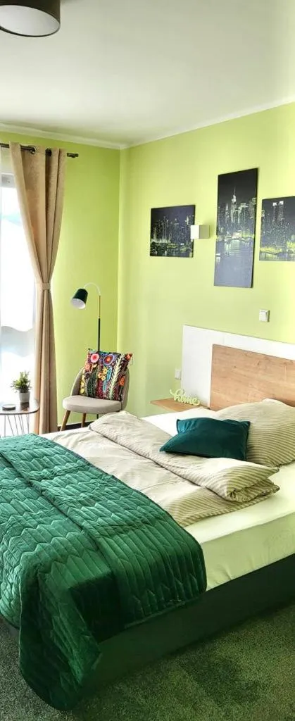 Bed in LikeDaheim Apartments