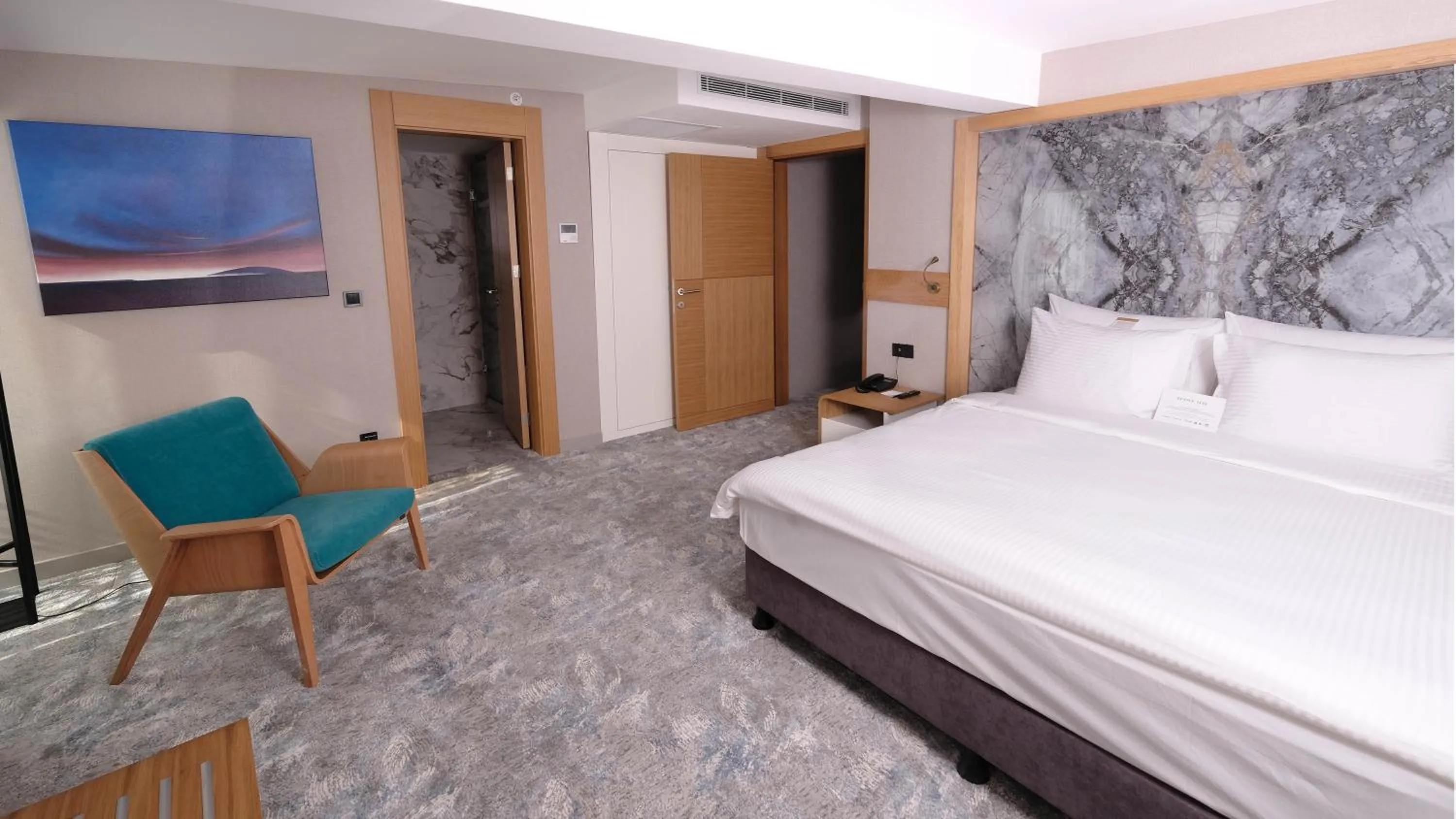 Bed in Grande Arte Hotel