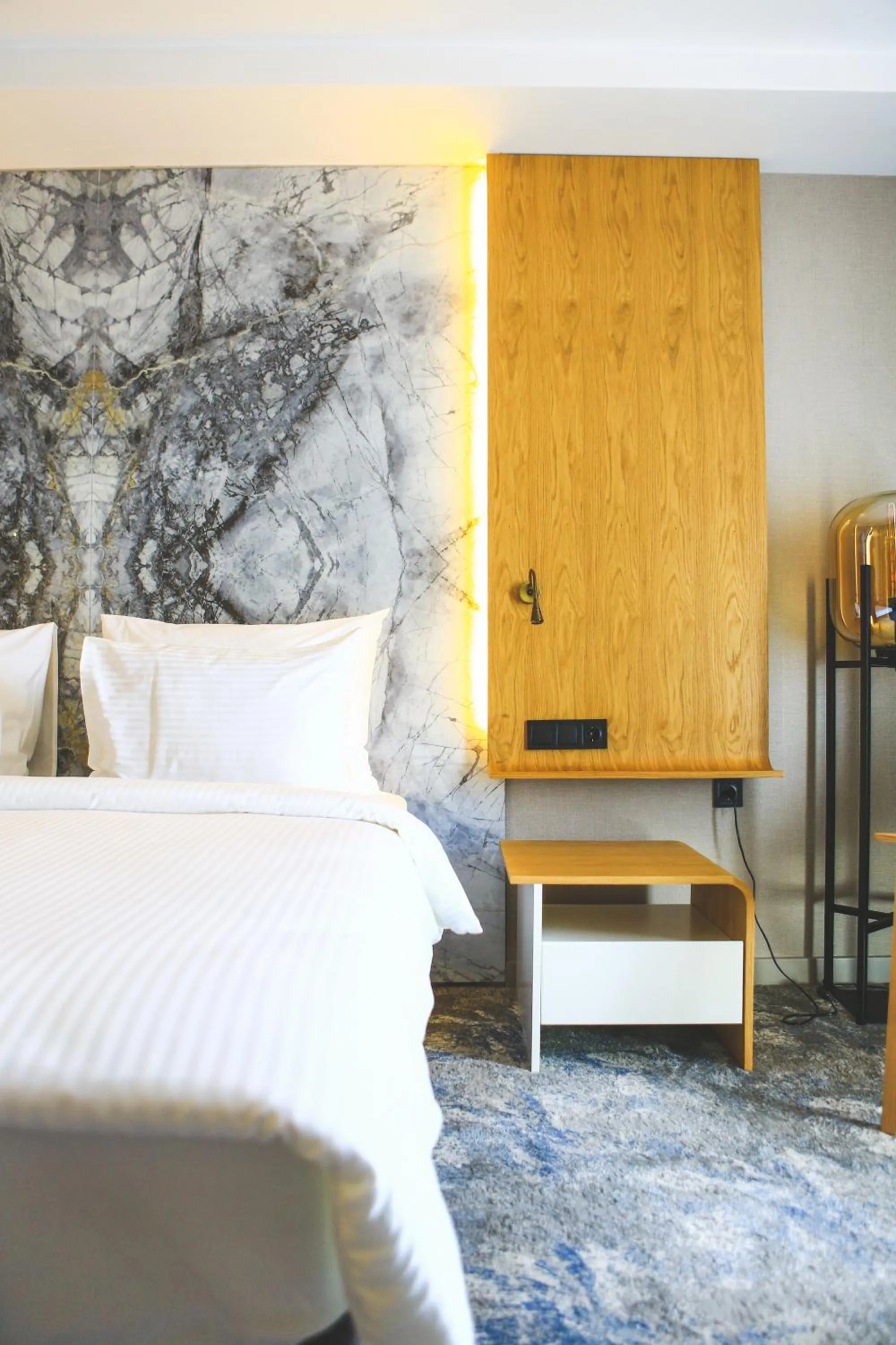 Bed in Grande Arte Hotel