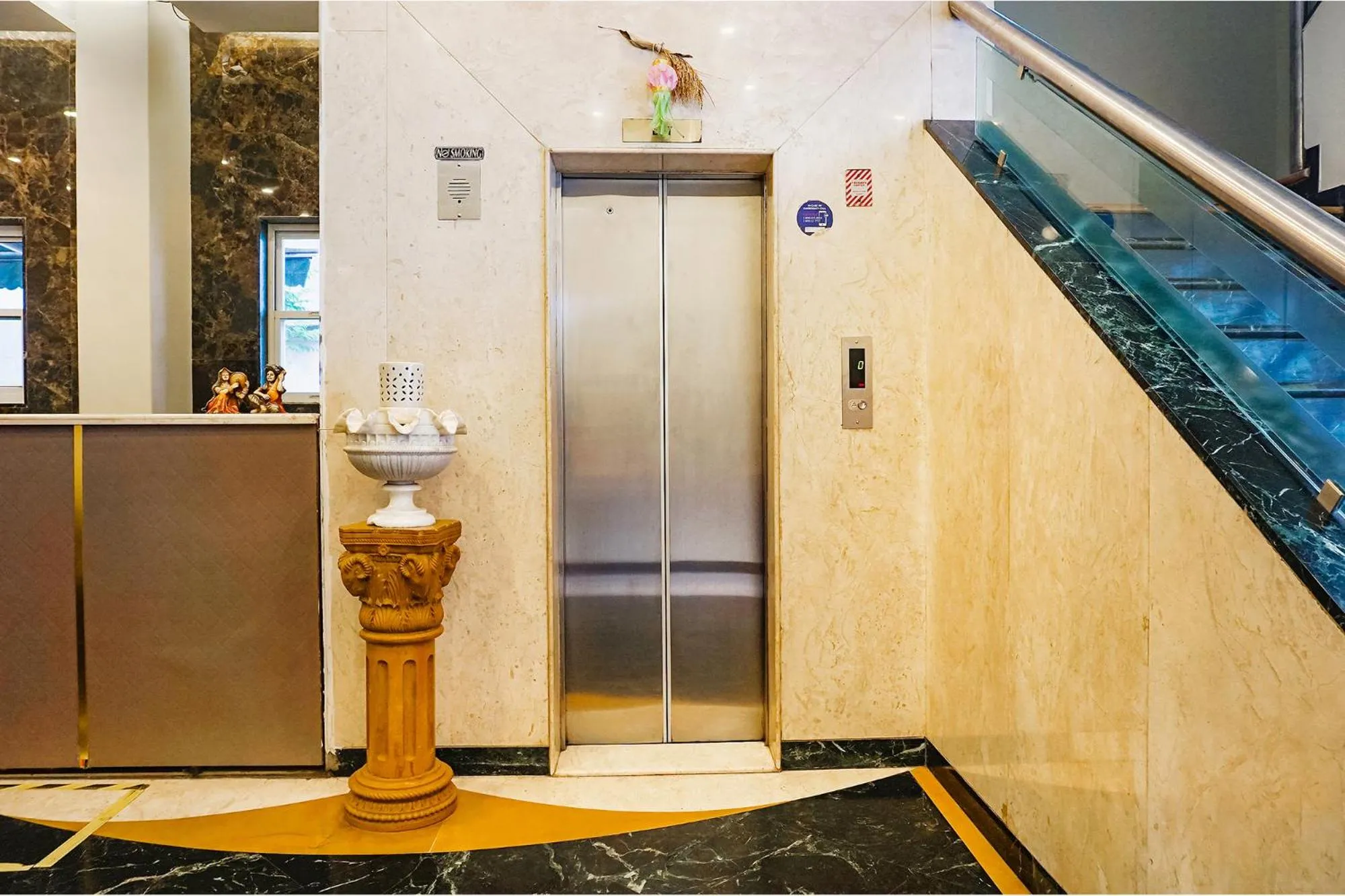 elevator in FabHotel Prime Golden Emerald - Nr St Mary's Church CNI