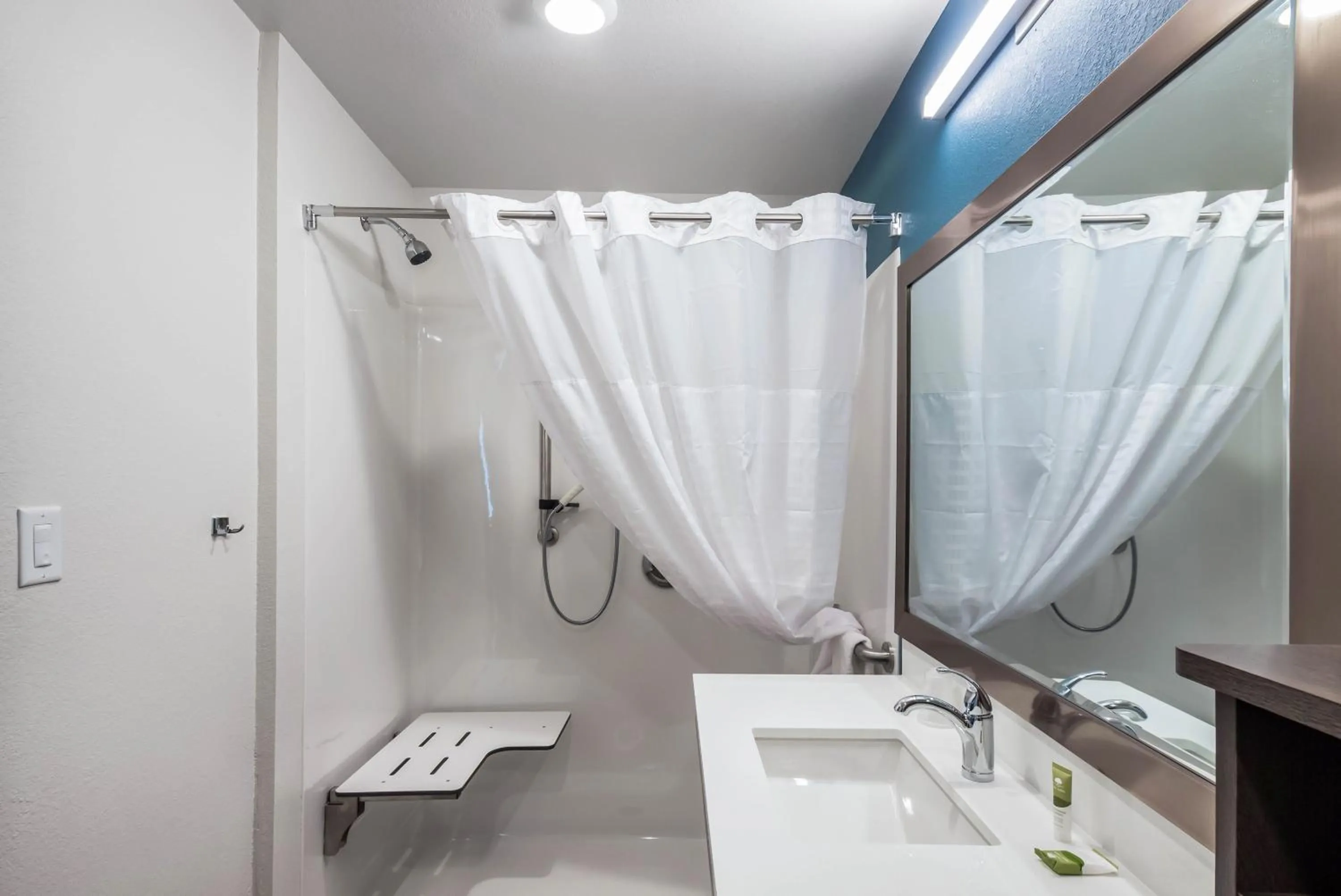 Bathroom in WoodSpring Suites Gurnee - Chicago